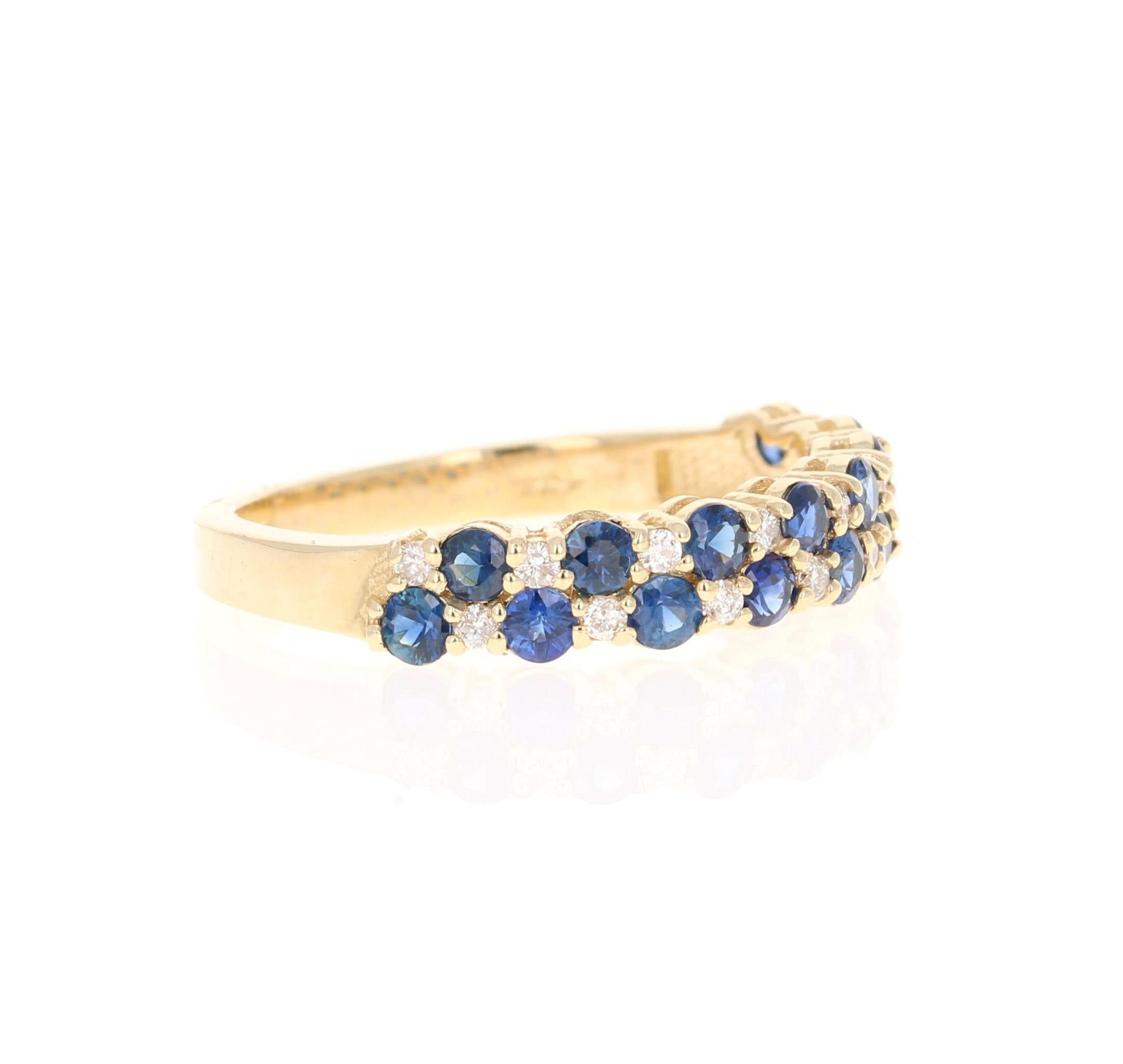 There are 16 Round Cut Sapphires that weigh 0.91 carats and 16 Round Cut Diamonds that weigh 0.16 carats (Clarity: SI, Color: F).  The total carat weight of the band is 1.07 carats. The band is made in 14K Yellow Gold and weighs approximately 2.3