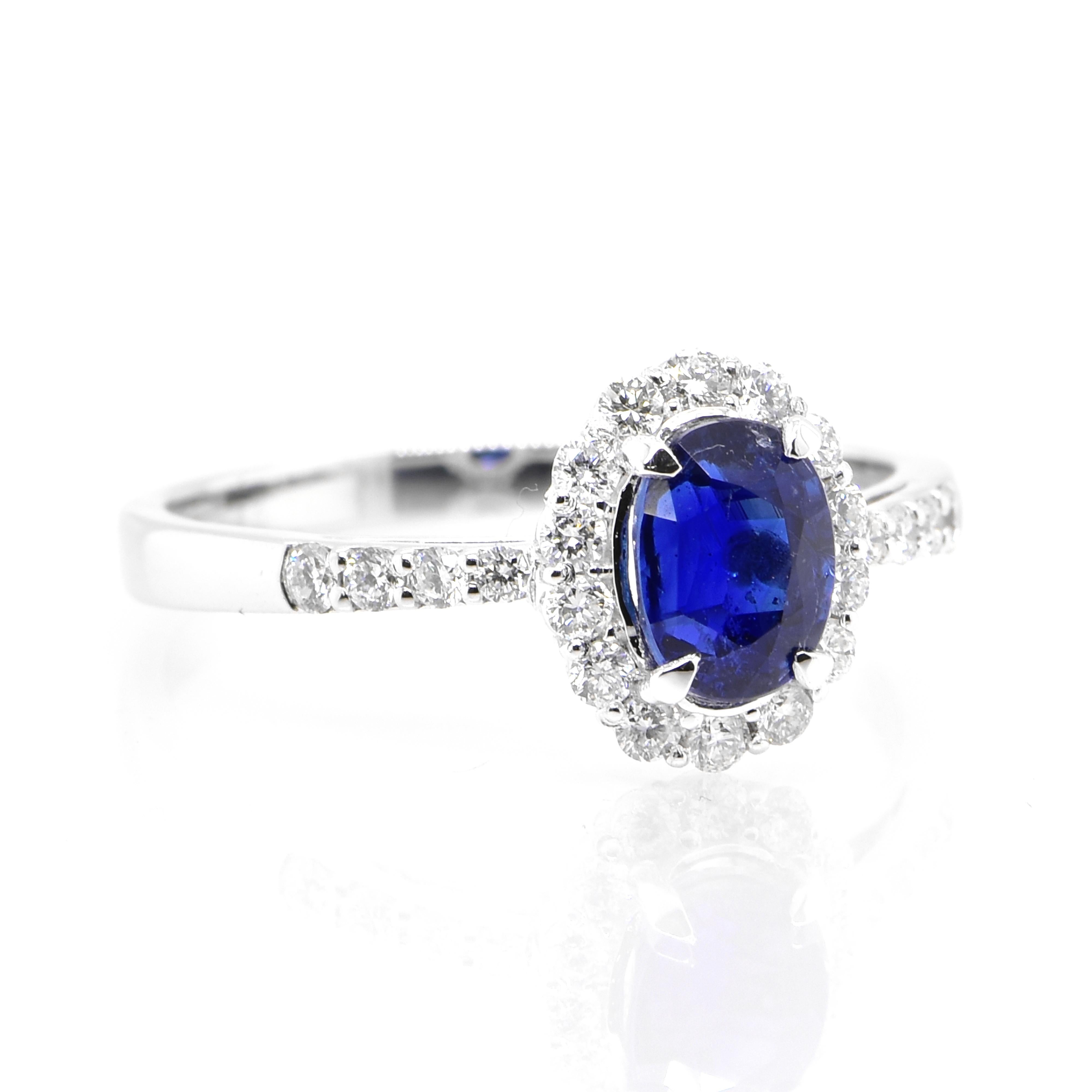 Modern 1.07 Carat, Unheated, Royal Blue Color Sapphire and Diamond Ring Set in Platinum For Sale