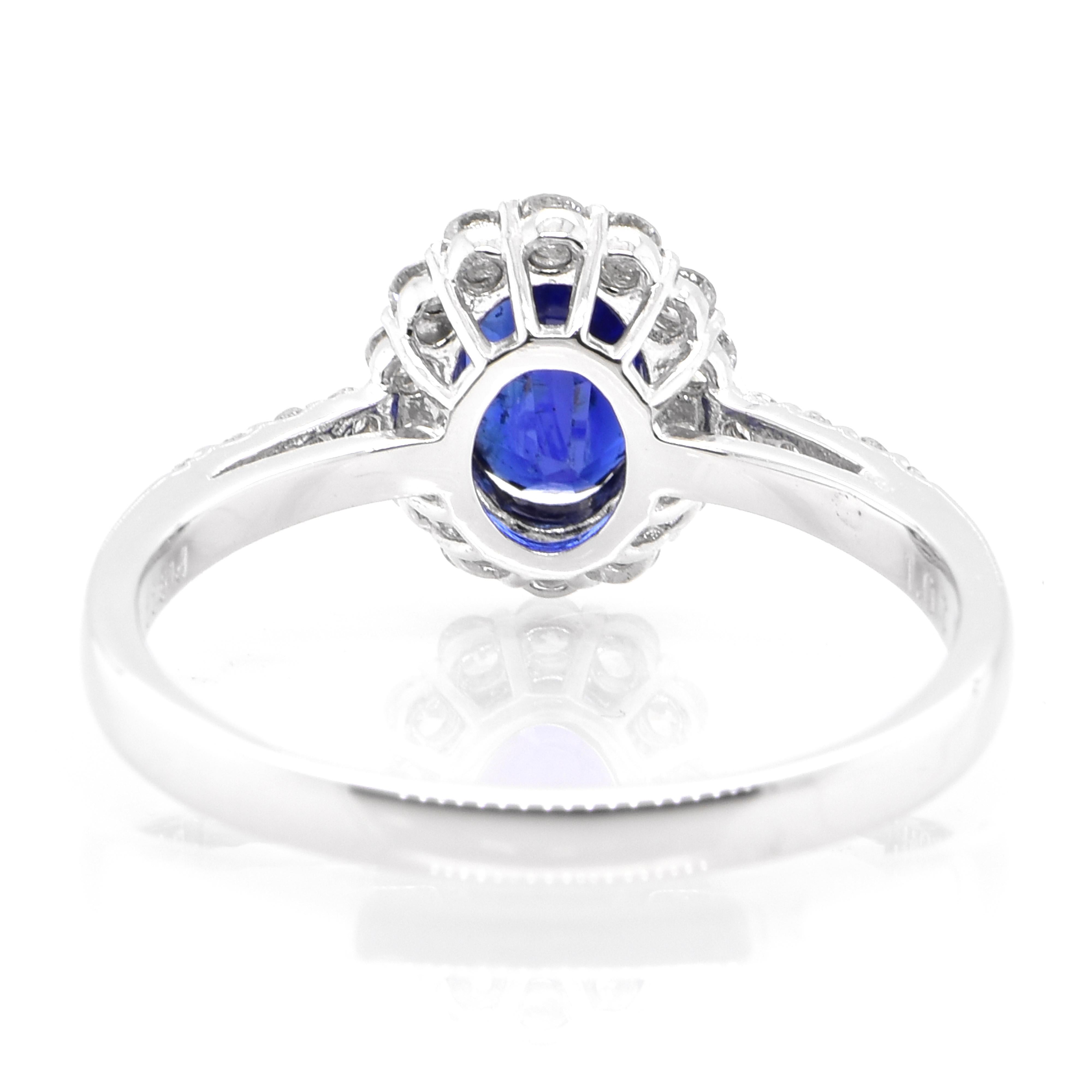 Women's 1.07 Carat, Unheated, Royal Blue Color Sapphire and Diamond Ring Set in Platinum For Sale