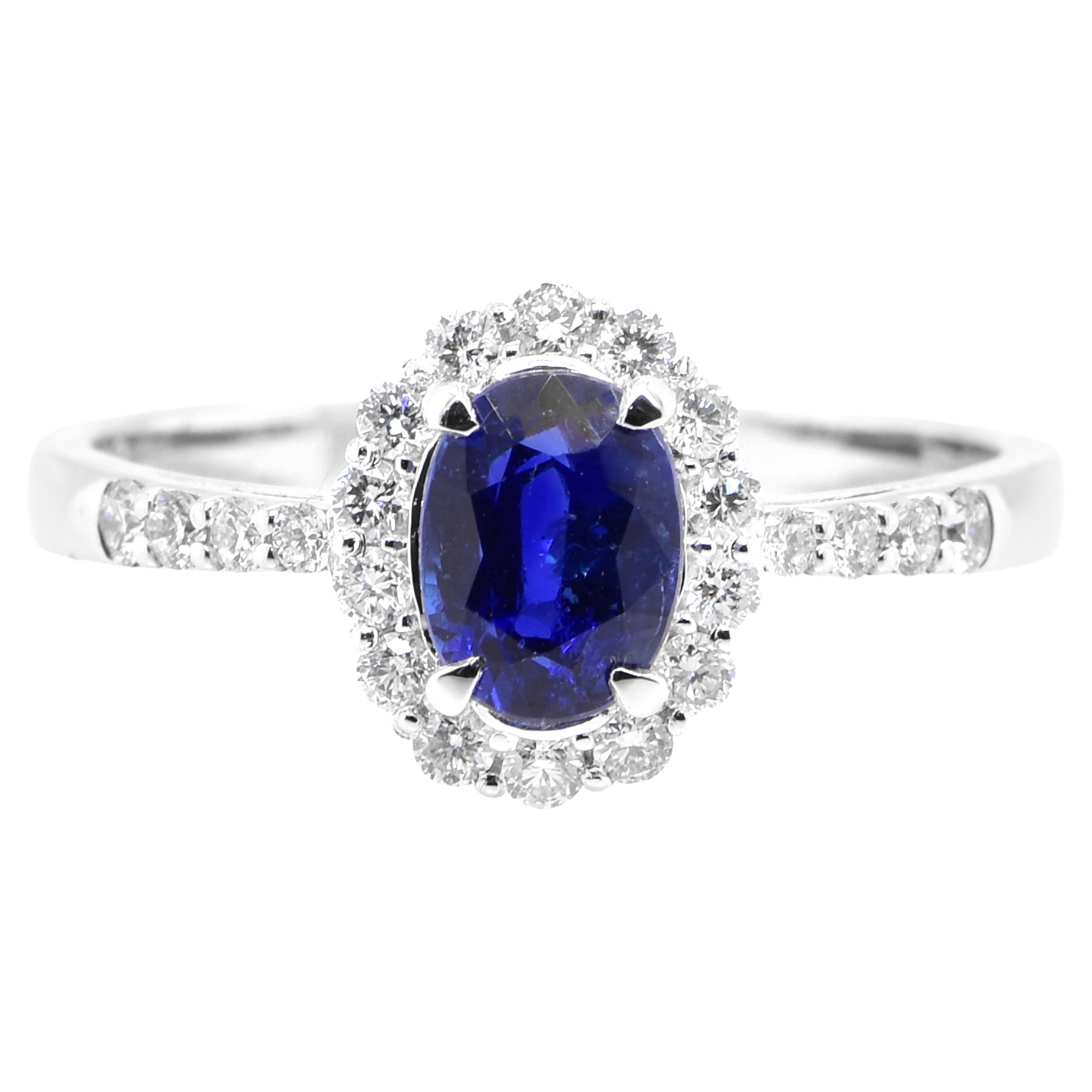 1.07 Carat, Unheated, Royal Blue Color Sapphire and Diamond Ring Set in Platinum For Sale