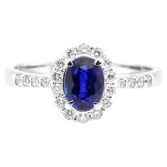 1.07 Carat, Unheated, Royal Blue Color Sapphire and Diamond Ring Set in Platinum