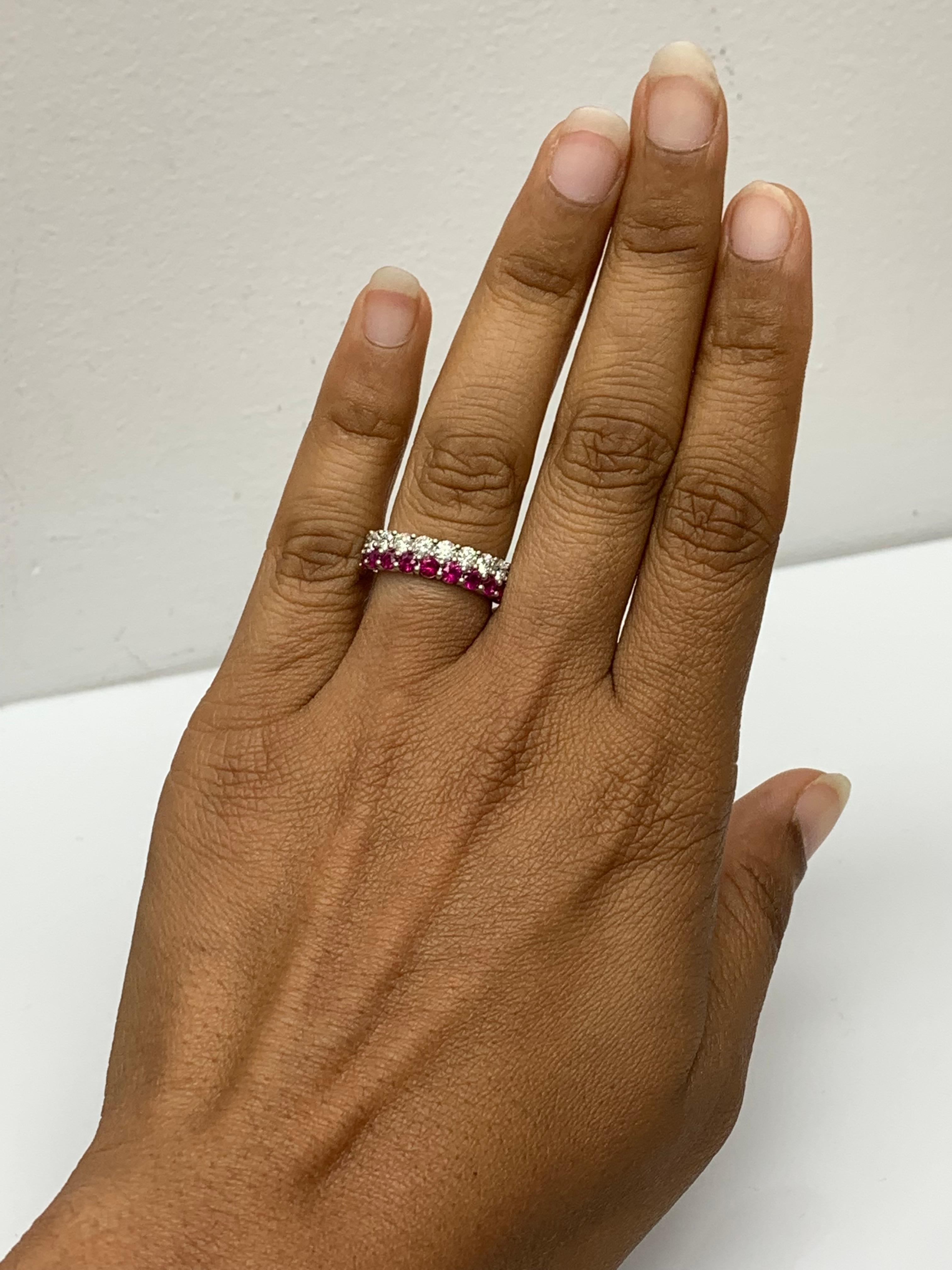 A unique and fashionable ring showcasing two rows of round-shape 10 rubies and 11 diamonds, set in a band design. Rubies weigh 1.07 carats and Diamonds weigh 1.01 carats in total. A brilliant and masterfully-made piece.

Style is available in