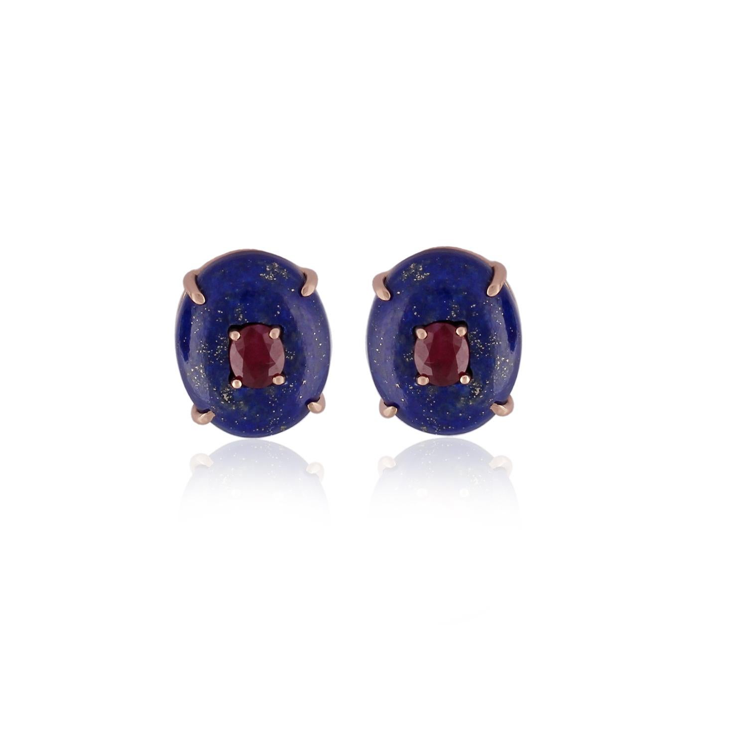 Art Deco style Stud earrings, natural lapis lazuli buttons with 2 small Oval cut Ruby in the center Set in 18k Gold.
 
Gold    -   3.13gm
lapis lazuli    -    10.70 Carat
Ruby      -       1.08 Carat

