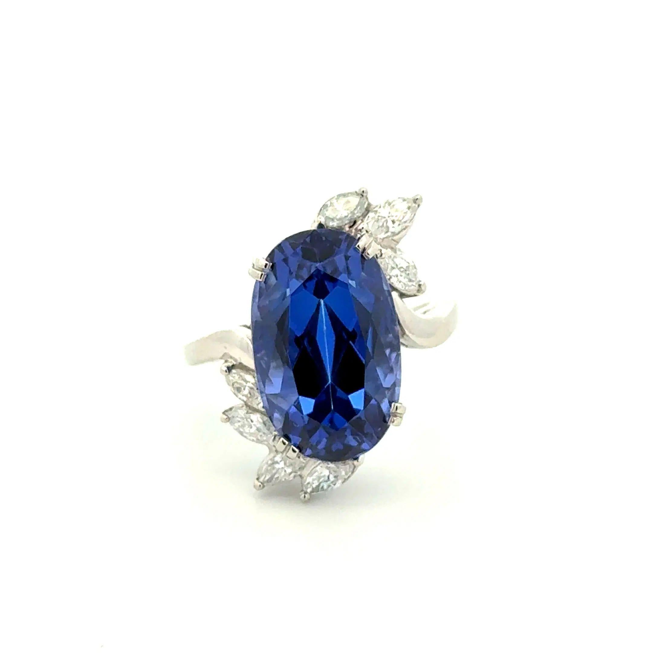 Taille mixte Bague vintage en platine avec Tanzanite ovale de 10,70 carats GIA et diamant marquis en vente