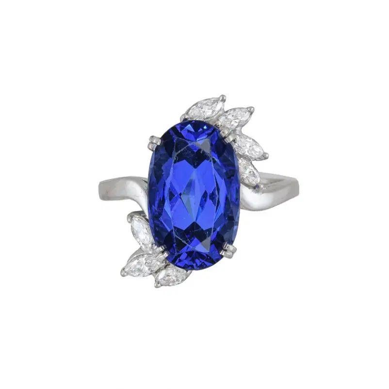 Bague vintage en platine avec Tanzanite ovale de 10,70 carats GIA et diamant marquis Excellent état - En vente à Montreal, QC