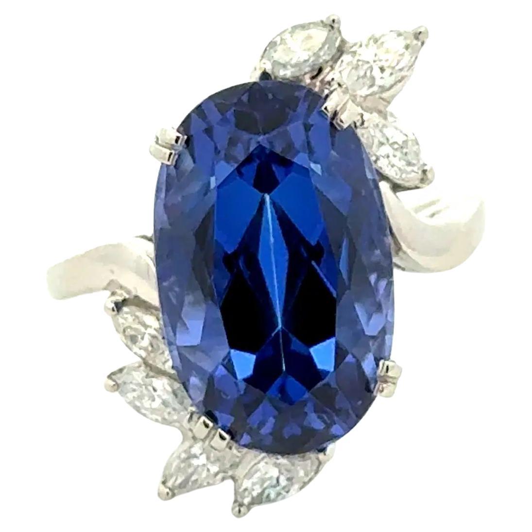 Bague vintage en platine avec Tanzanite ovale de 10,70 carats GIA et diamant marquis en vente