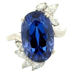 10.70 Carat Oval Tanzanite GIA and Marquis Diamond Platinum Vintage Ring