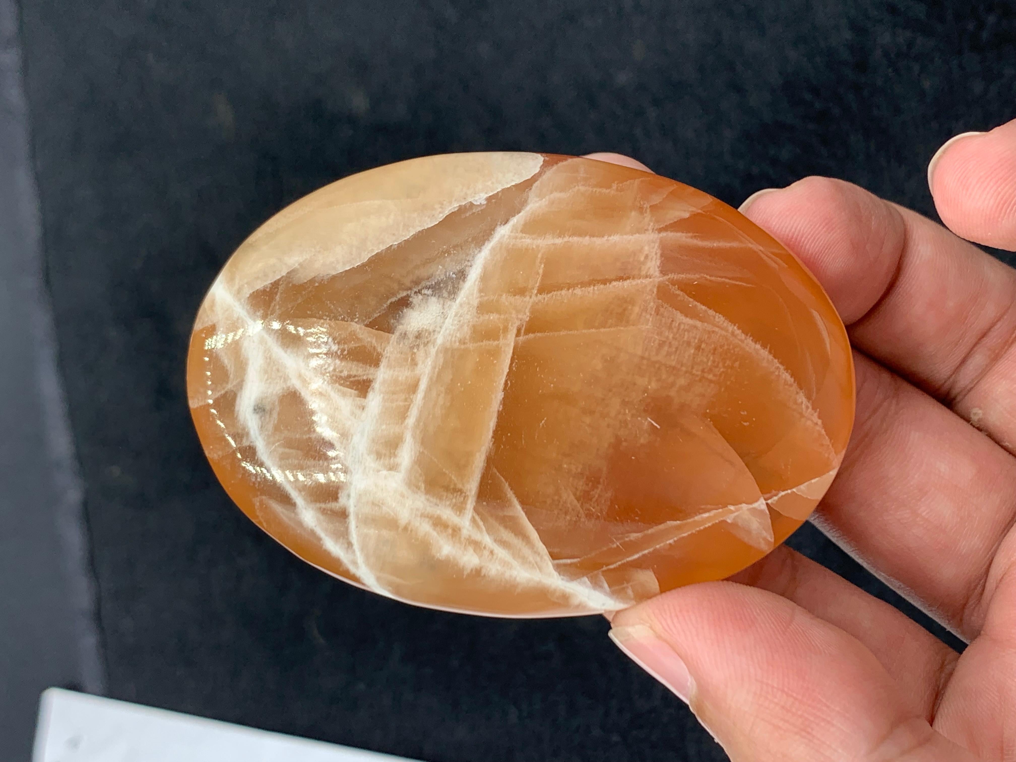PRODUCT INFORMATION: 

Specimen Type: Best Quality Oval Honey Calcite Crystal 
Weight: 107.04 Gram
Dimension: H: 6.4 x W: 4.2 x D: 1.6 Cm 
Origin: Pakistan 
Treatment: None

DESCRIPTION:

Introducing a magnificent 107.04 gram oval Calcite crystal