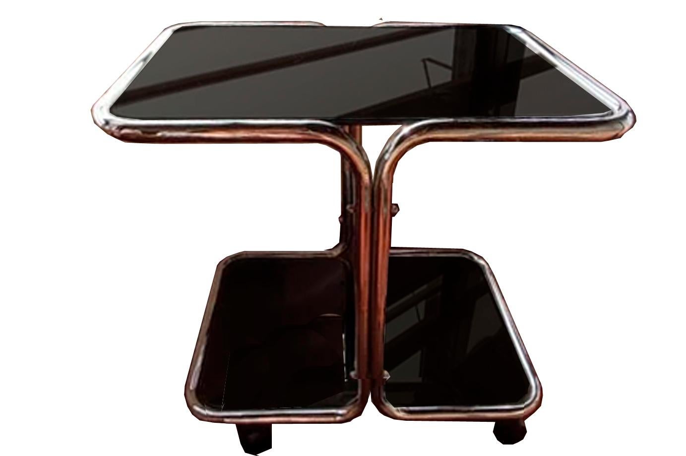 European  Coffee table steel tube and smoked glass with wheels Italy 70s For Sale