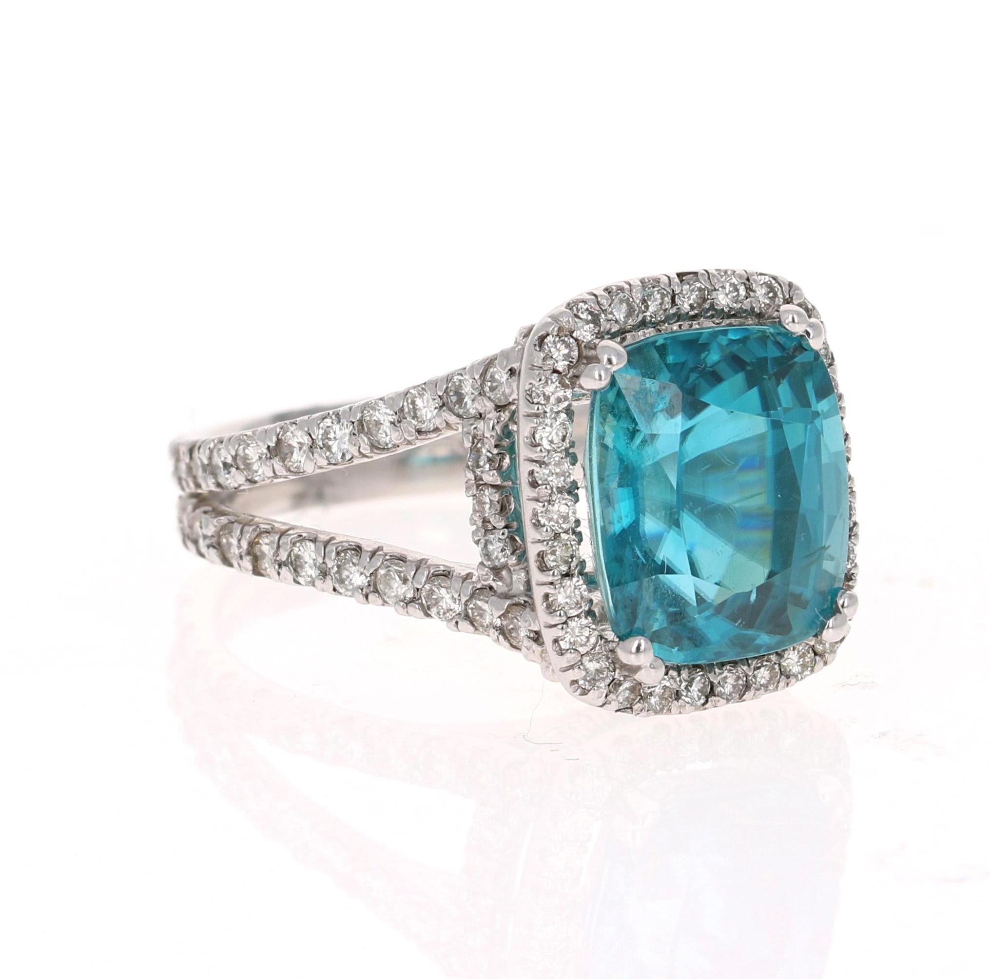 A beautiful Blue Zircon and Diamond ring that can be a nice Engagement ring or a gorgeous Cocktail Ring!
Blue Zircon is a natural stone mined mainly in Sri Lanka, Myanmar, and Australia.  

This ring has a large & beautiful Oval/Cushion Cut Blue