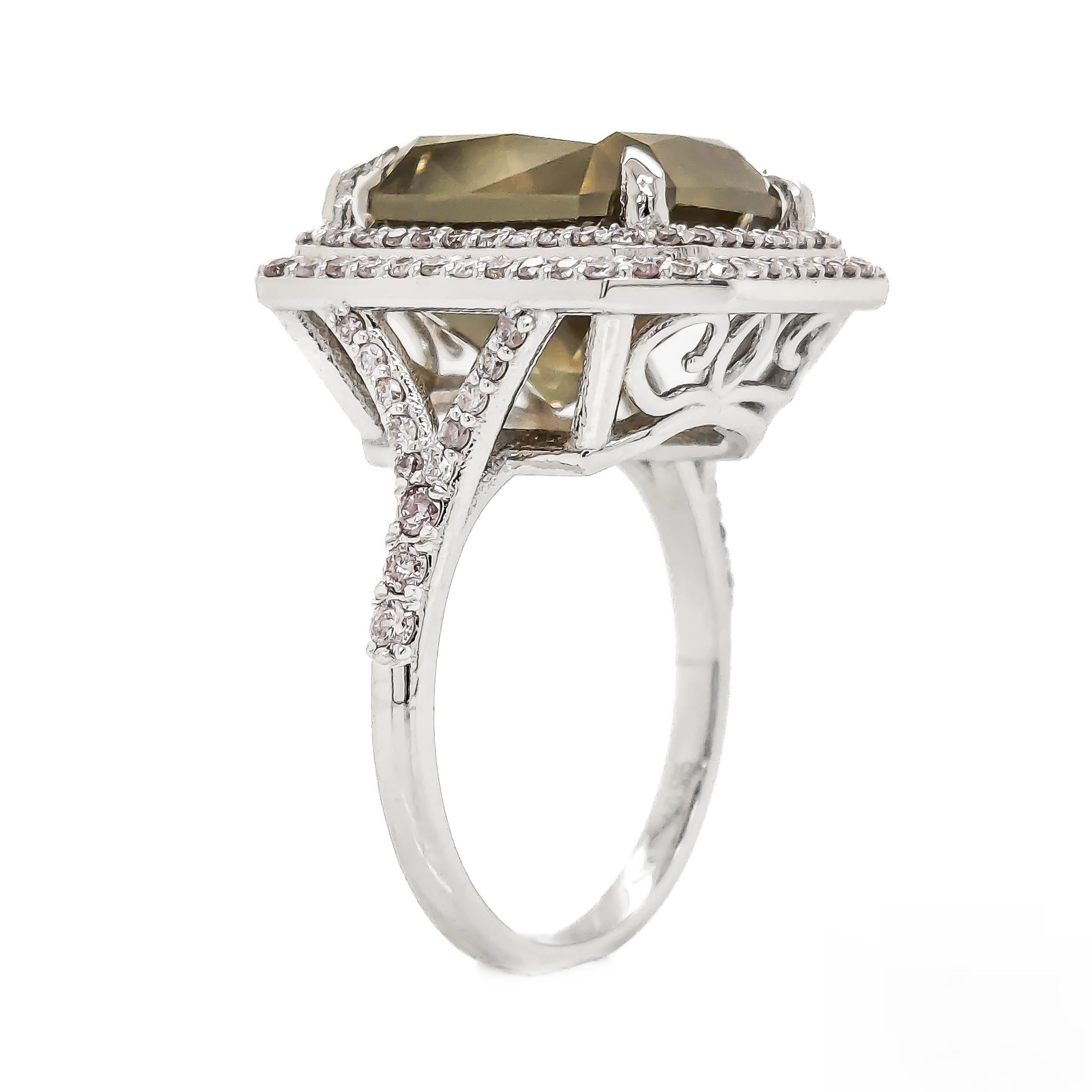 FOR U.S. BUYERS NO VAT NO CUSTOMS FEES

Indulge in the enchanting allure of this extraordinary ring, featuring a rare fancy intense greenish brown-yellow 10.02-carat natural diamond center stone. The 116 delicate and feminine natural round brilliant