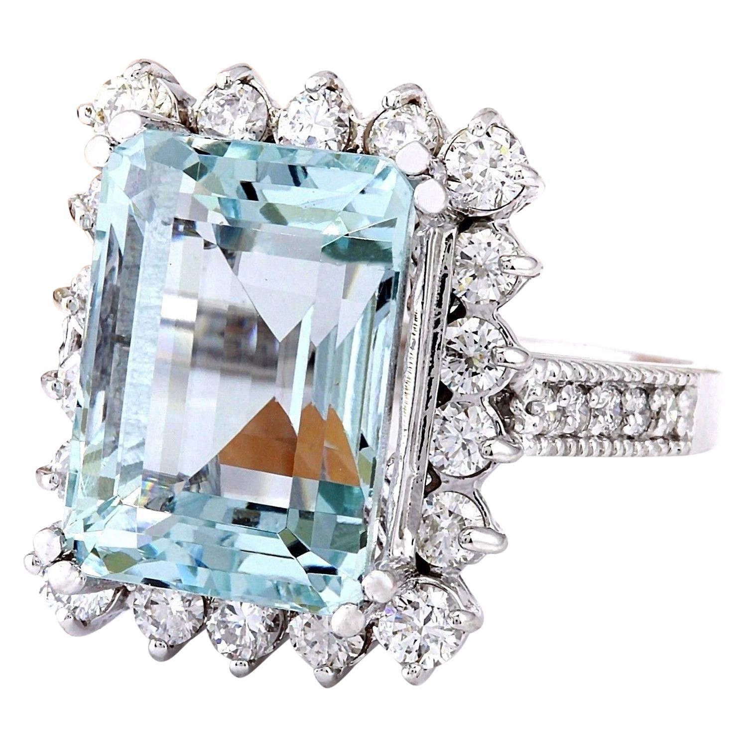 Embrace the ethereal beauty of this stunning Aquamarine Diamond Cocktail Ring, a magnificent statement piece crafted in solid 14K White Gold. Weighing a remarkable 10.73 carats in total, this ring exudes opulence and sophistication.

At its center,