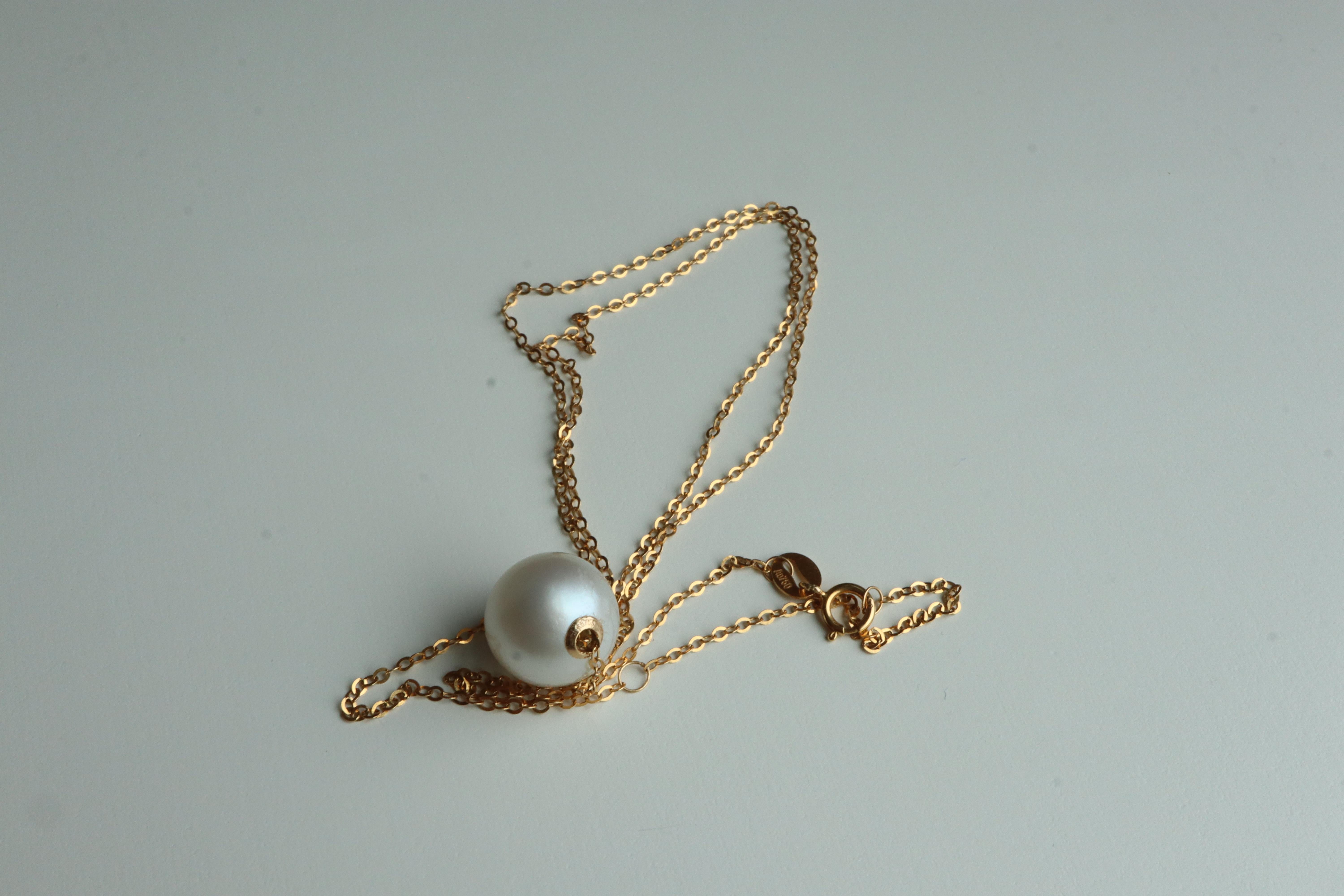Collana di perle dei mari del sud da 10,73 mm in oro massiccio 18 carati in vendita 2