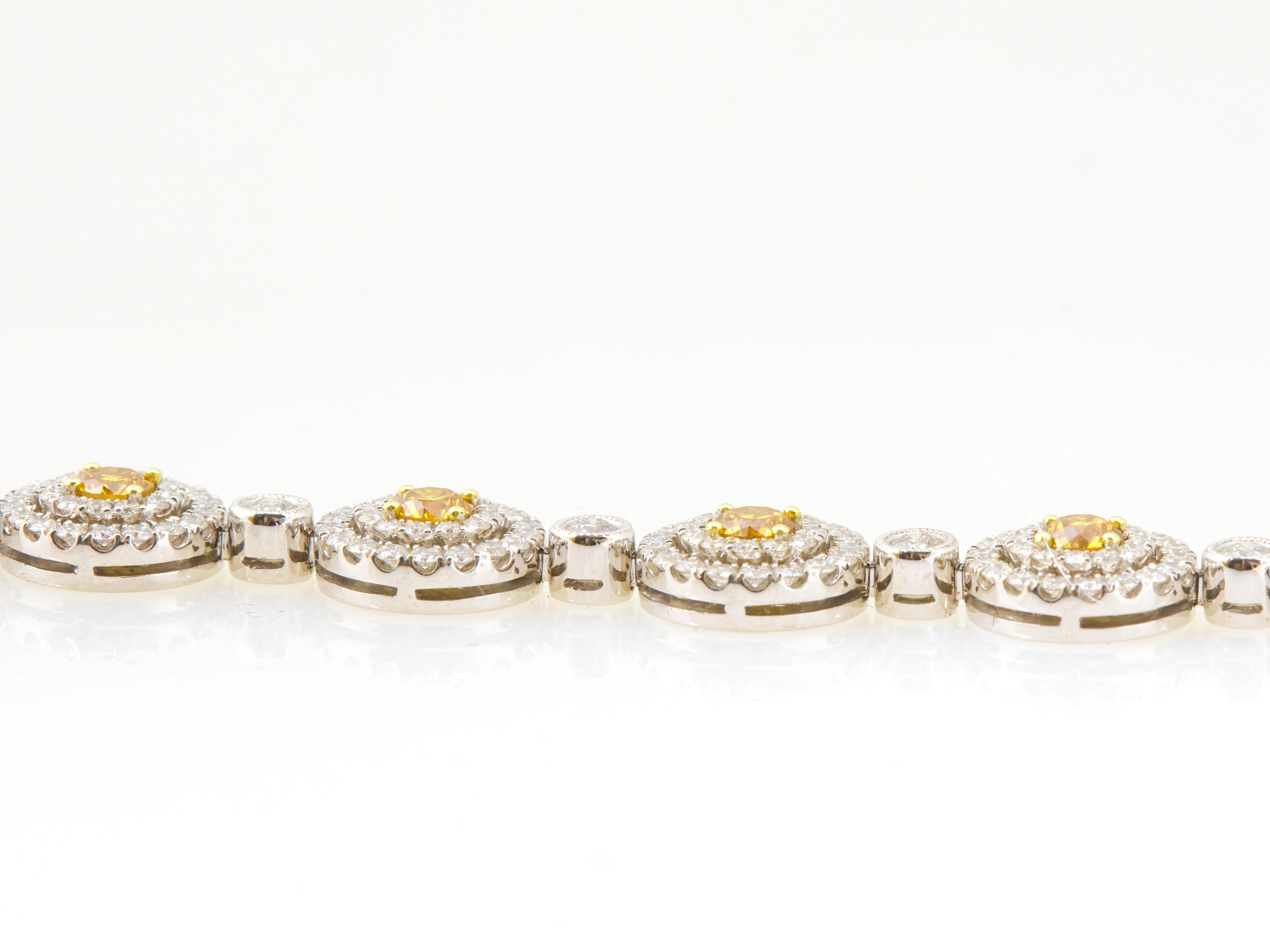 Modern 10.74 Carat Fancy Vivid Orange-Yellow and White Diamond Bracelet, GIA Certified For Sale