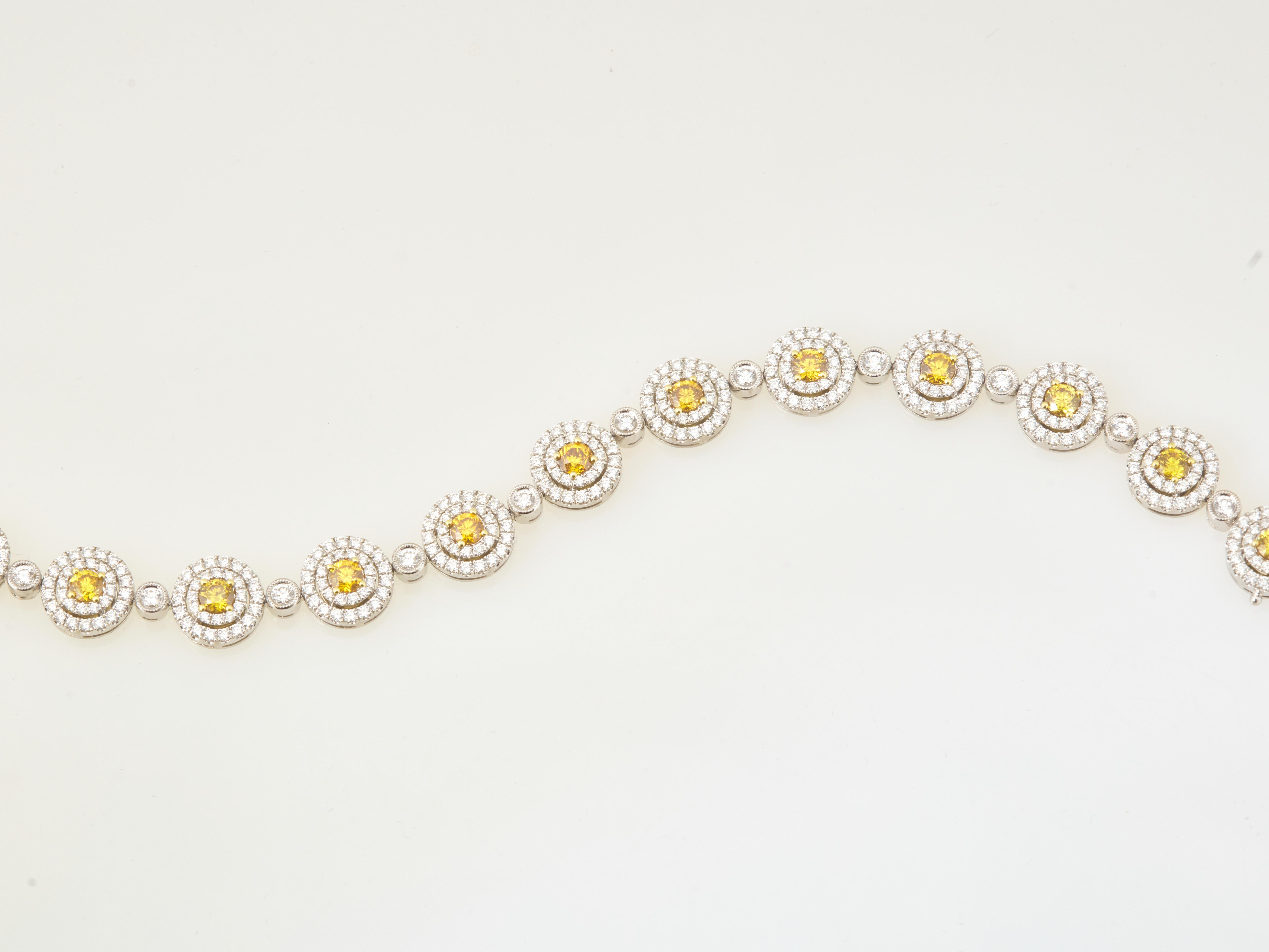 Round Cut 10.74 Carat Fancy Vivid Orange-Yellow and White Diamond Bracelet, GIA Certified  For Sale