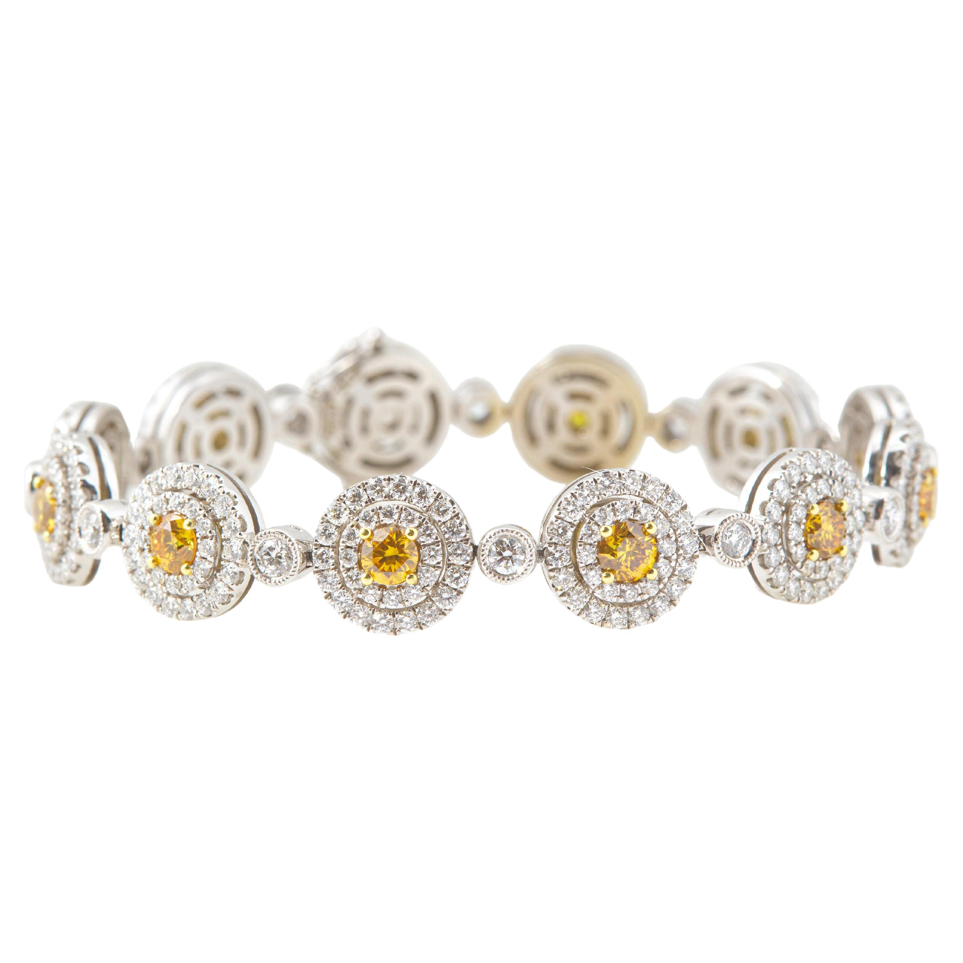 10.74 Carat Fancy Vivid Orange-Yellow and White Diamond Bracelet, GIA Certified For Sale