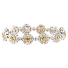 10.74 Carat Fancy Vivid Orange-Yellow and White Diamond Bracelet, GIA Certified