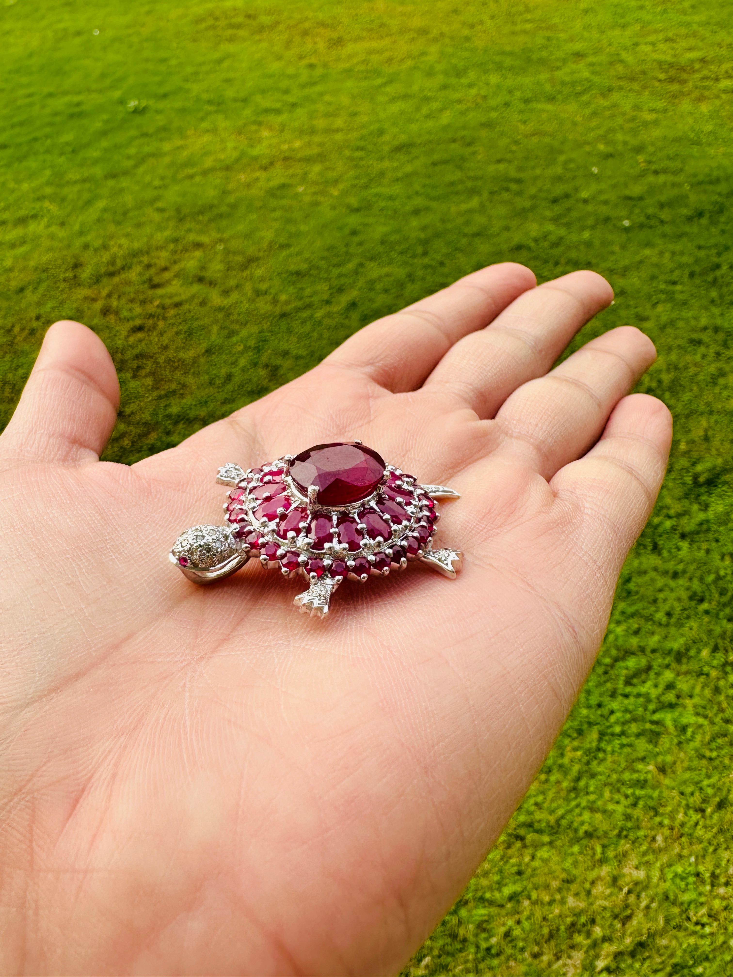 This 10.75 Carat Genuine Ruby Birthstone and Diamond Turtle Pendant is meticulously crafted from the finest materials and adorned with stunning ruby which enhances confidence, leadership qualities and attract career opportunities.
This delicate to