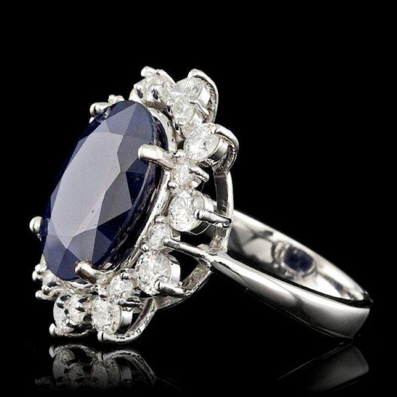 10.75 Carats Exquisite Natural Blue Sapphire and Diamond 14K Solid White Gold Ring

Total Blue Sapphire Weight is: Approx. 9.5 Carats 

Sapphire Measures: Approx. 15.00 x 12.00mm

Sapphire treatment: Diffusion

Natural Round Diamonds Weight: Approx.