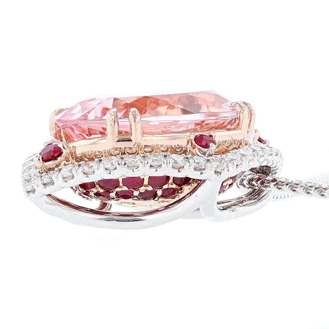 This necklace is made in 14k white gold and is designed by Nazarelle. It features a 10.79ct oval cut Morganite, prong set, for the center stone. There are 36 round cut diamonds weighing 0.80ct, prong set, on the pendant with Color Grade (G) Clarity