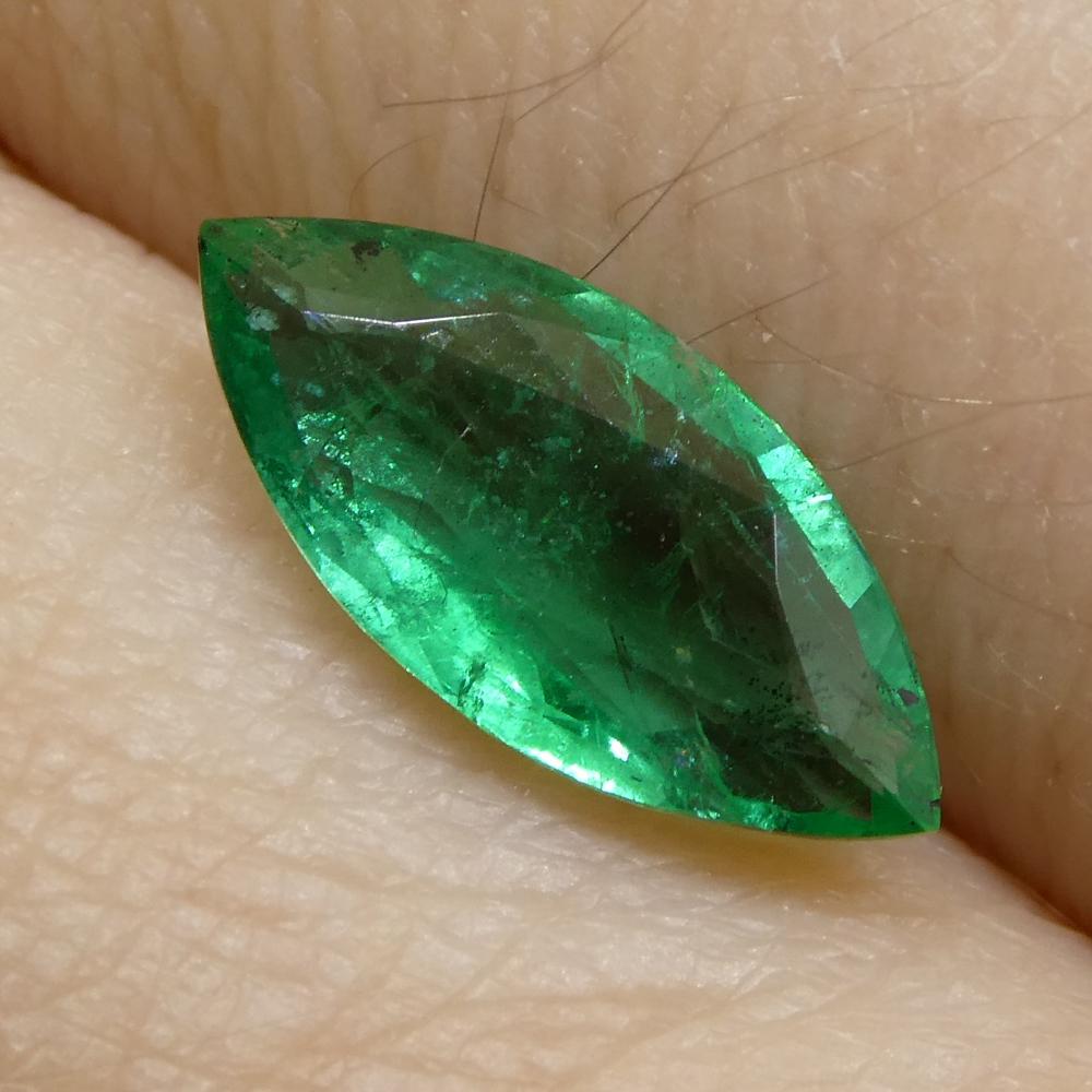 Description:

Gem Type: Emerald 
Number of Stones: 1
Weight: 1.07 cts
Measurements: 11.39 x 5.14 x 2.82 mm
Shape: Marquise
Cutting Style Crown: Brilliant Cut
Cutting Style Pavilion: Modified Brilliant Cut 
Transparency: Transparent
Clarity: Slightly