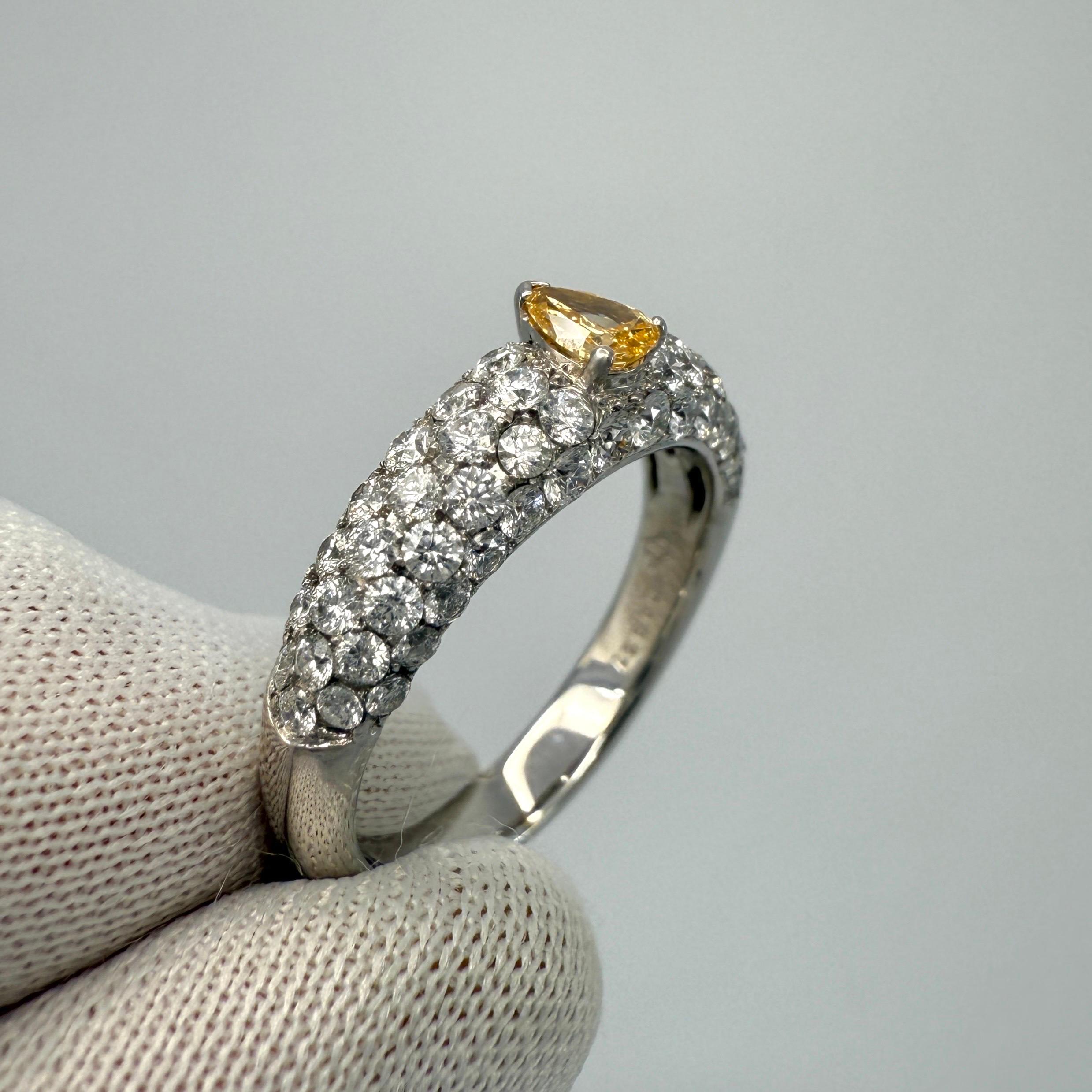 Women's or Men's 1.07ct Natural Fancy Vivid Orange Yellow Pear Diamond 18k White Gold Pave Ring For Sale