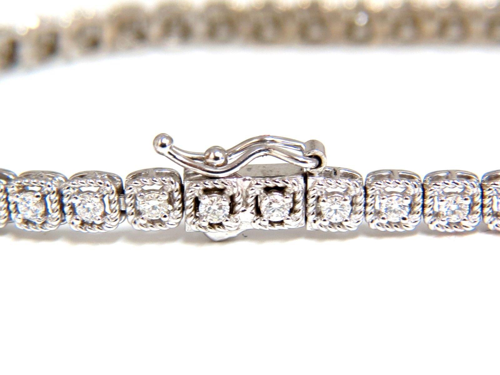 Tennis Box, Rope Twist

1.08ct. Natural  diamonds bracelet.

Round, full cuts 

F/G color 

Vs-2 clarity.

14kt. white gold 

8.8 Grams.

Width of bracelet: 3.7mm

7 inch wearable length

safety clasp/ snap lock

$4,000 Appraisal Certificate will