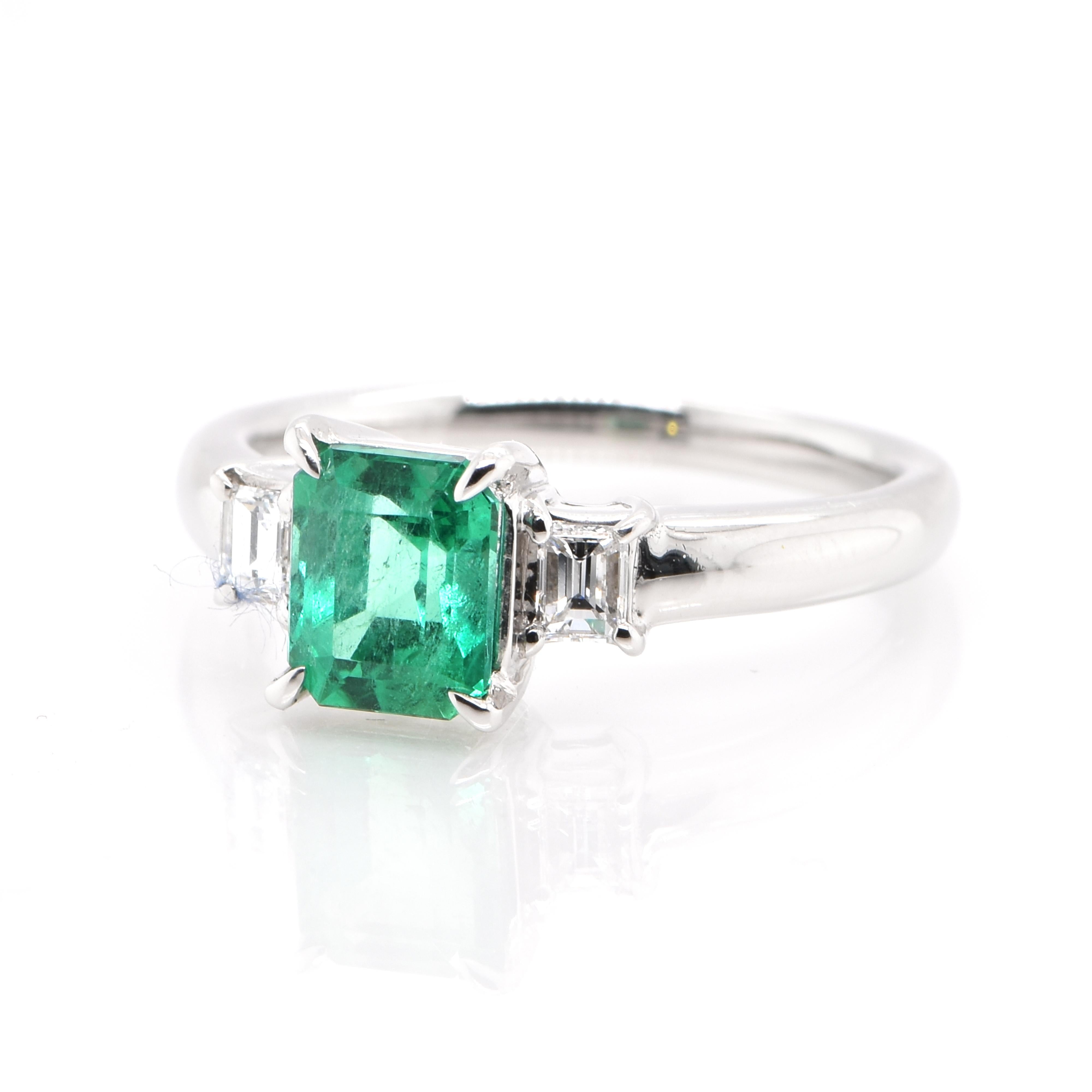 A stunning Ring featuring a 1.08 Carat, Natural, Colombian Emerald and 0.20 Carats of Diamond Accents set in Platinum. People have admired emerald’s green for thousands of years. Emeralds have always been associated with the lushest landscapes and