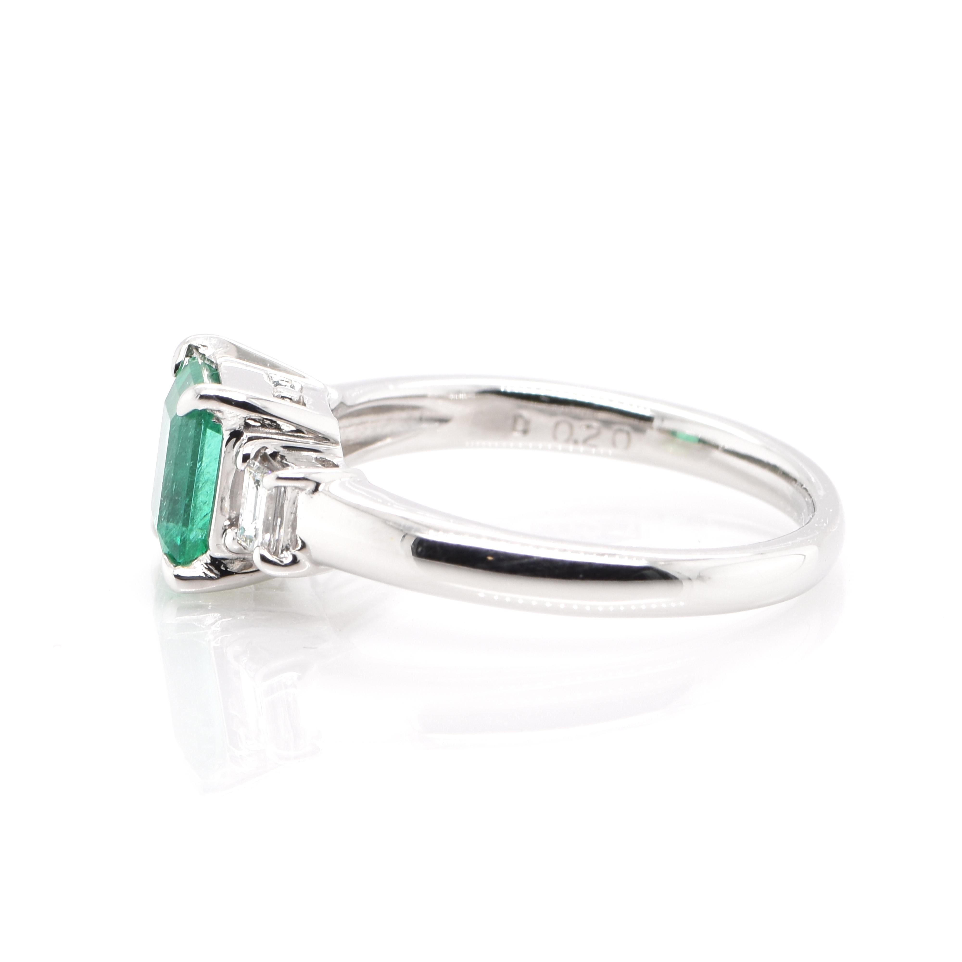 Emerald Cut 1.08 Carat Natural Colombian Emerald Three Stone Ring Set in Platinum