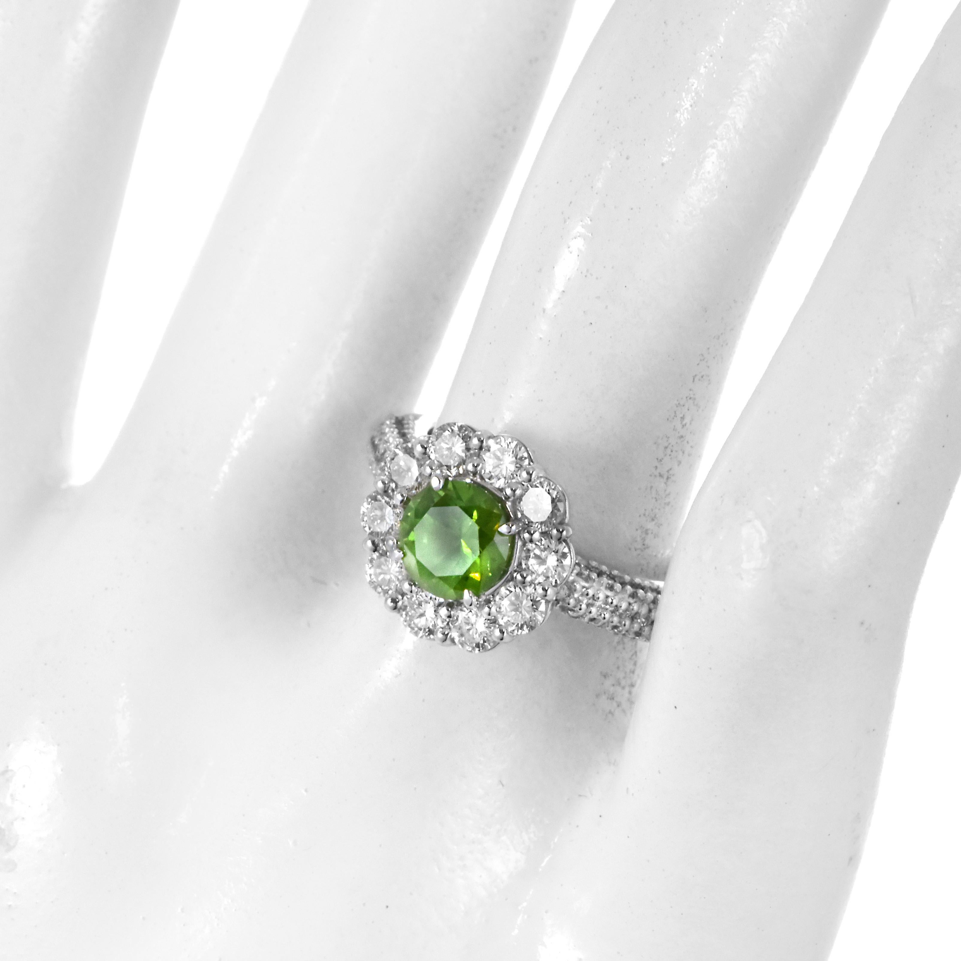 Modern 1.08 Carat Natural Demantoid Garnet and Diamond Halo Set Ring Made in Platinum For Sale