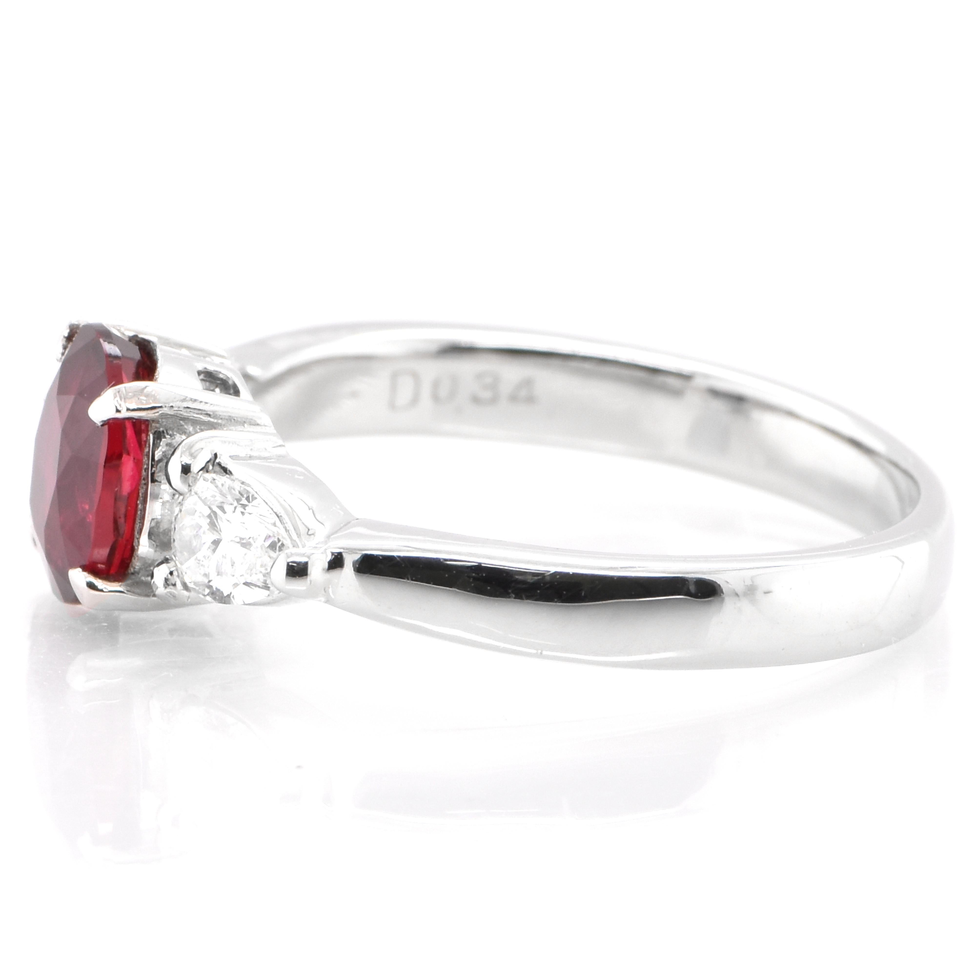 Oval Cut 1.08 Carat Natural Ruby and Diamond Three-Stone Ring Set in Platinum