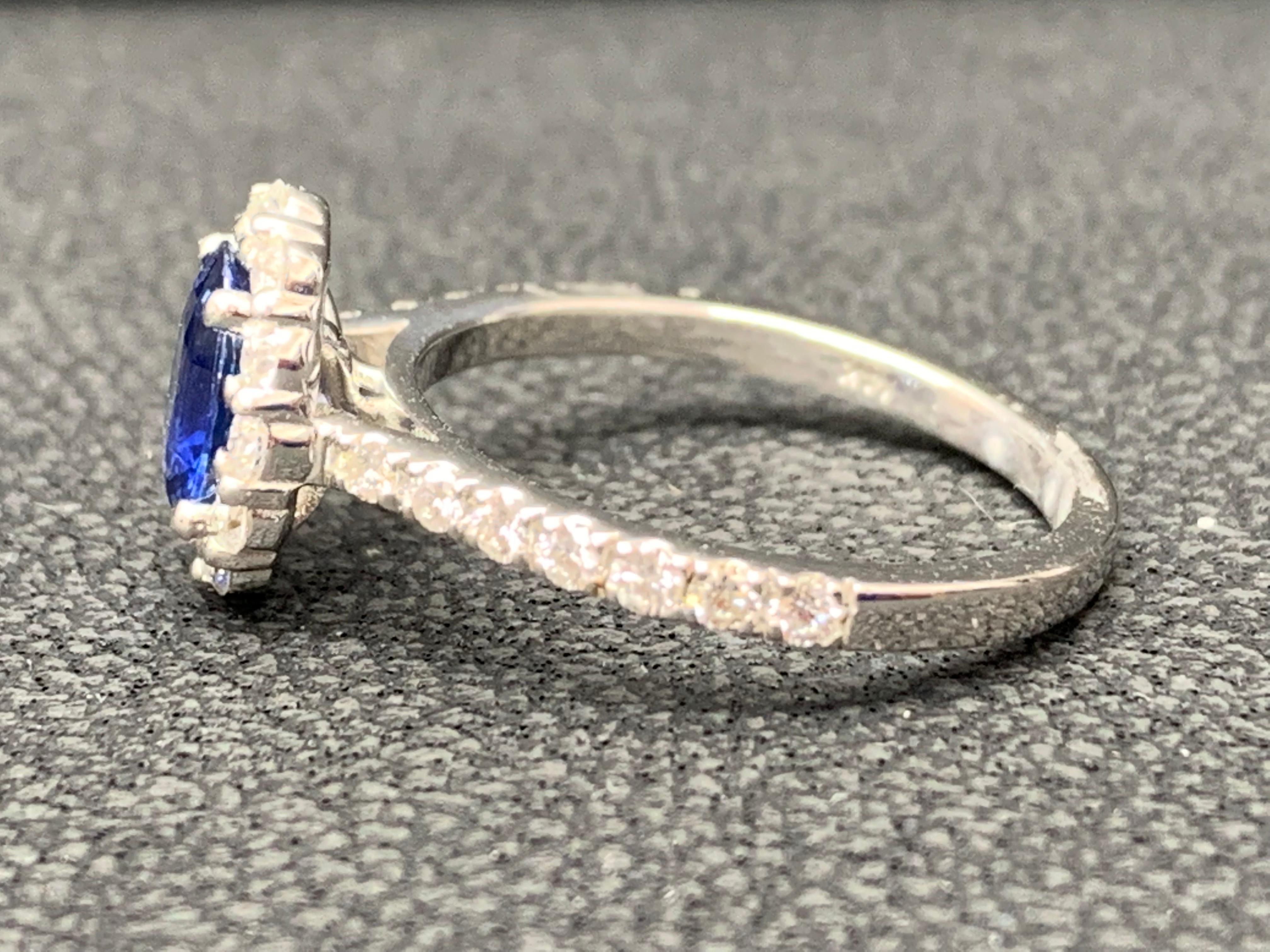 1.08 Carat Oval Cut Blue Sapphire and Diamond Engagement Ring in 14K White Gold In New Condition For Sale In NEW YORK, NY