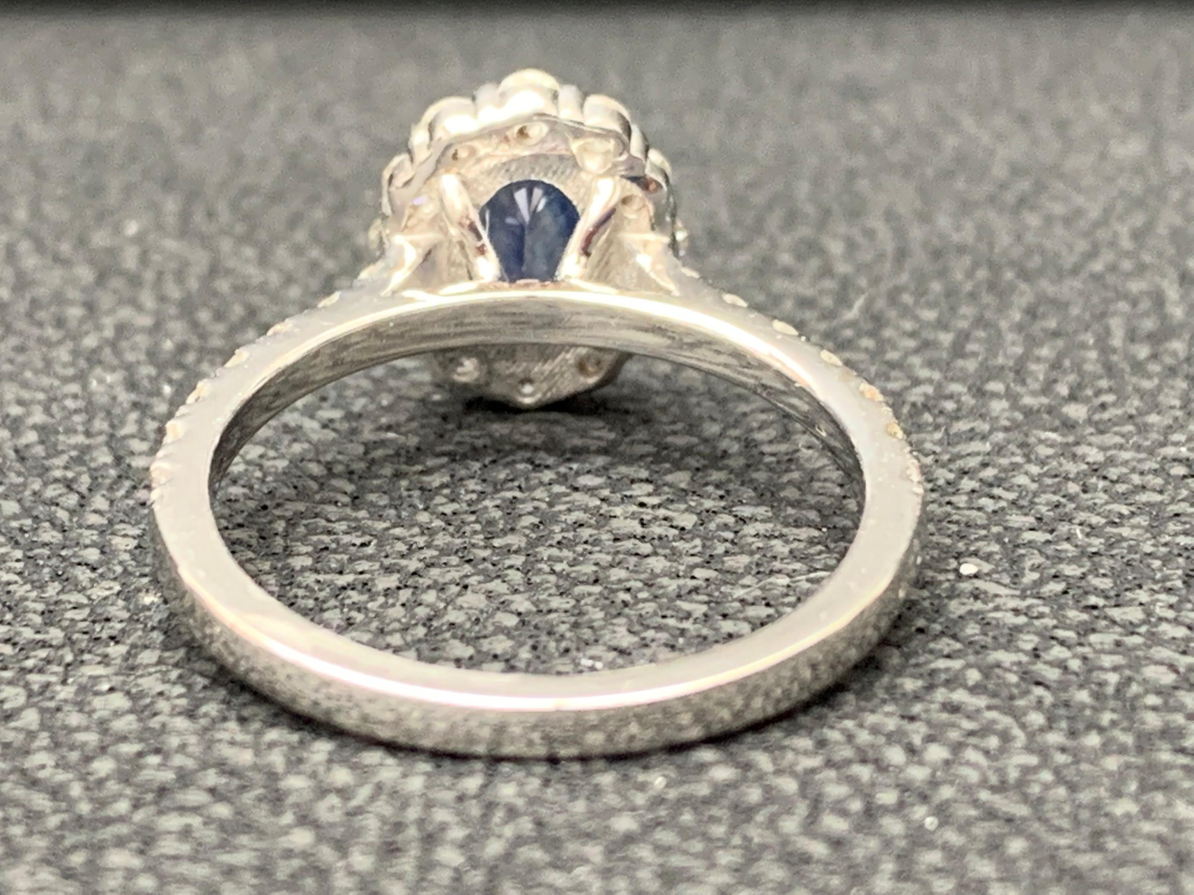 Women's 1.08 Carat Oval Cut Blue Sapphire and Diamond Engagement Ring in 14K White Gold For Sale