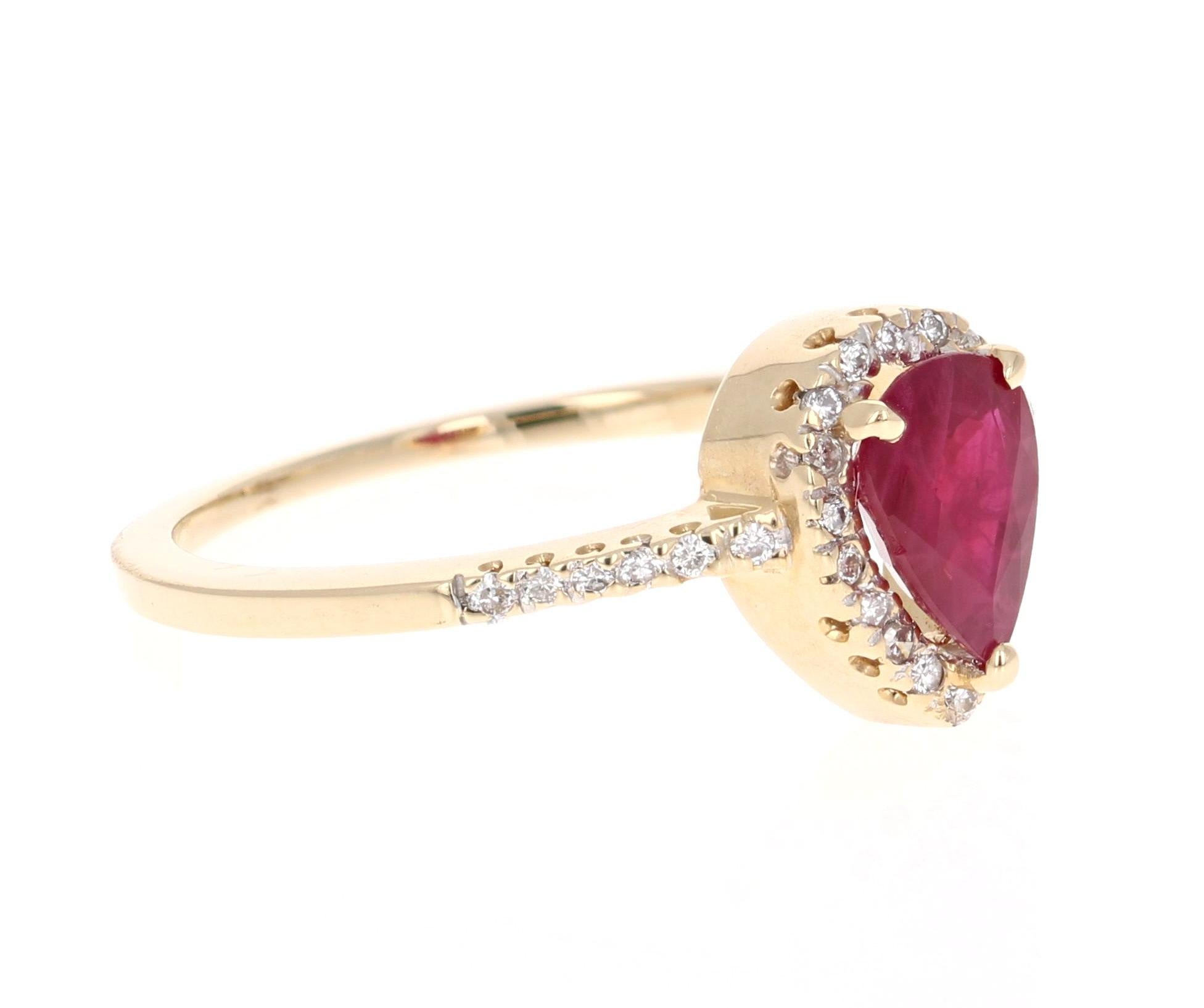 A simple yet beautiful ring with a 0.88 Carat Pear Cut Ruby as its center and 32 Round Cut Diamonds that weigh 0.20 carats. The total carat weight of the ring is 1.08 carats.

The ring is casted in 14K Yellow Gold and weighs approximately 2.4 grams.