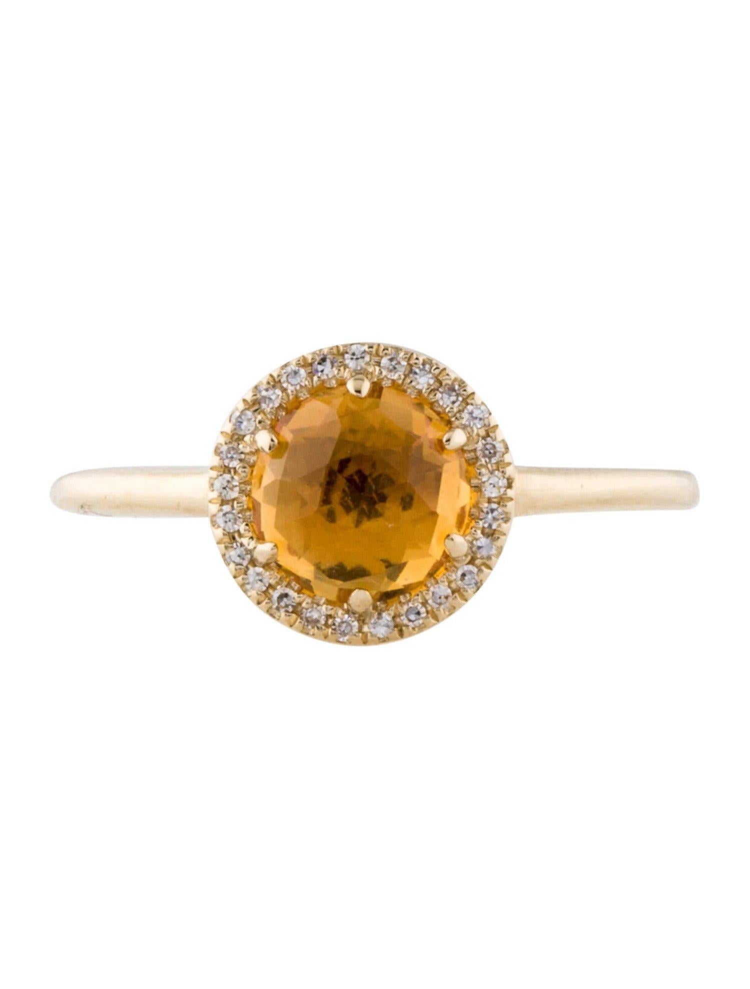 Cette bague en citrine et diamant est un accessoire étonnant et intemporel qui peut ajouter une touche de glamour et de sophistication à n'importe quelle tenue. 

Cette bague comporte une citrine ronde de 1,08 carat, avec un halo de diamants composé