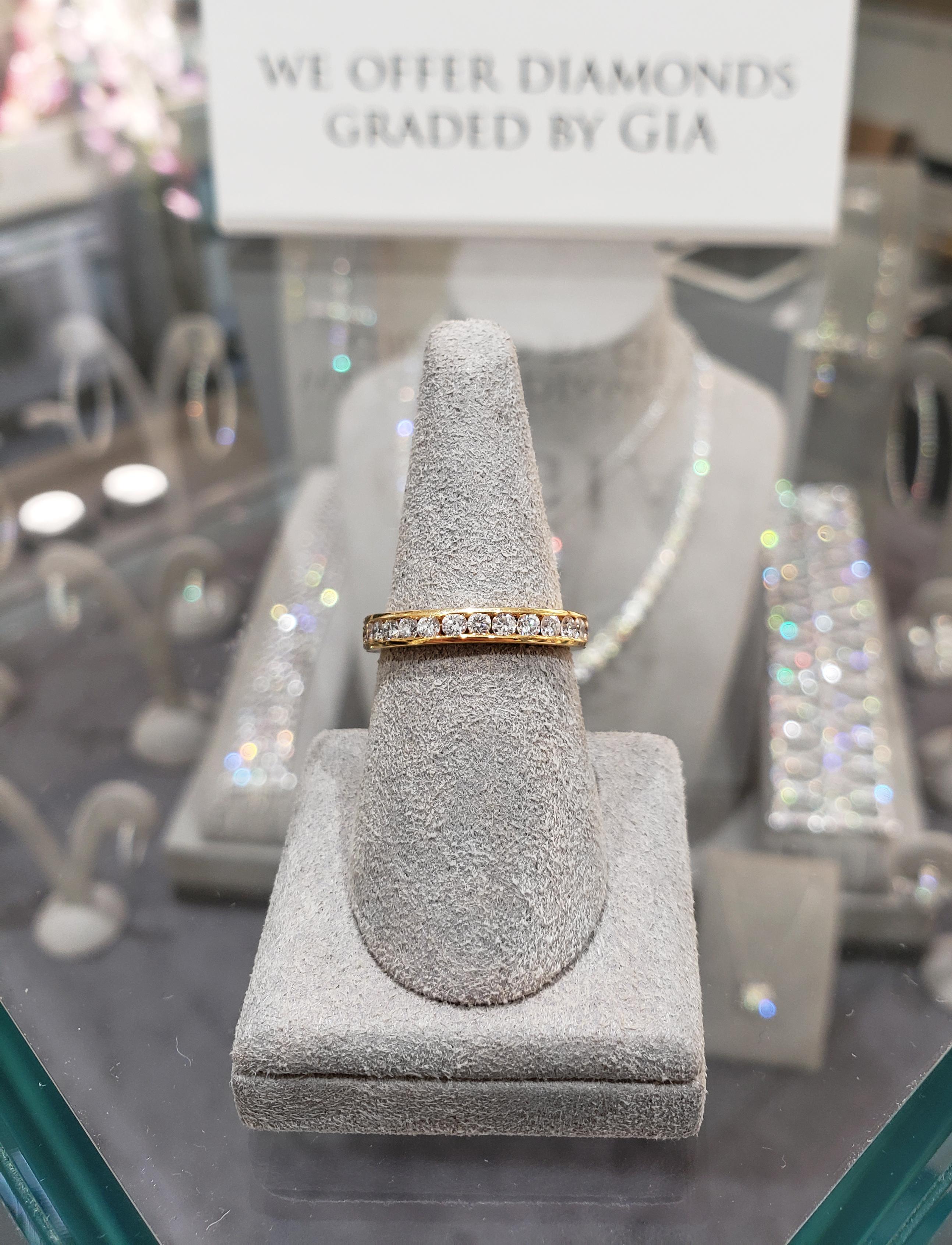A modern eternity wedding band ring, showcasing brilliant diamonds of 1.08 carats total. Channel set and made with 18K yellow gold. Size 5.25 US.

Roman Malakov is a custom house, specializing in creating anything you can imagine. If you would like