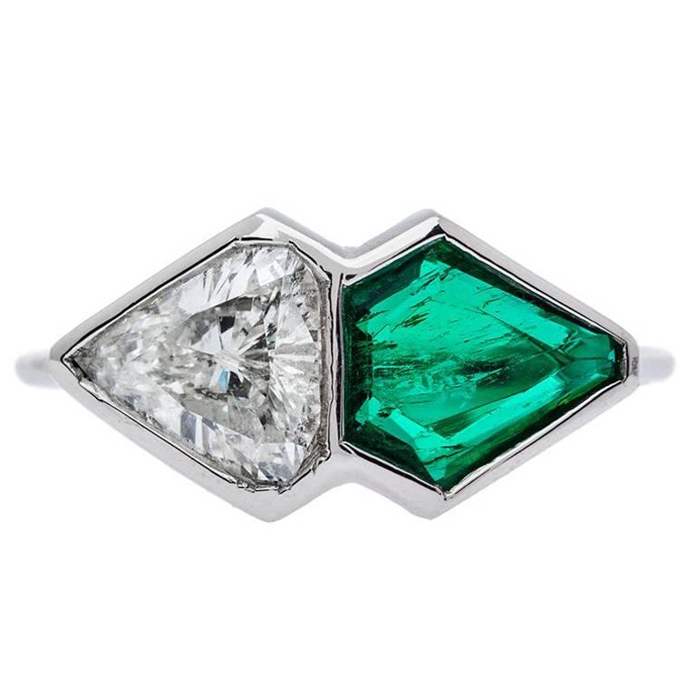 1.08 Carat Shield Cut Diamond 0.84 Carat Emerald Platinum Two-Stone Ring