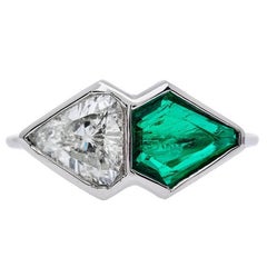1.08 Carat Shield Cut Diamond 0.84 Carat Emerald Platinum Two-Stone Ring