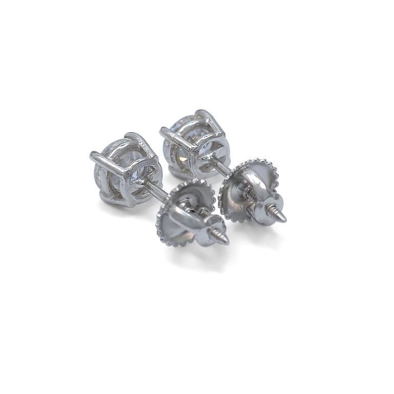 Taille ronde Boucles d'oreilles solitaires à vis en or blanc avec diamants ronds de 1,08 carat en vente