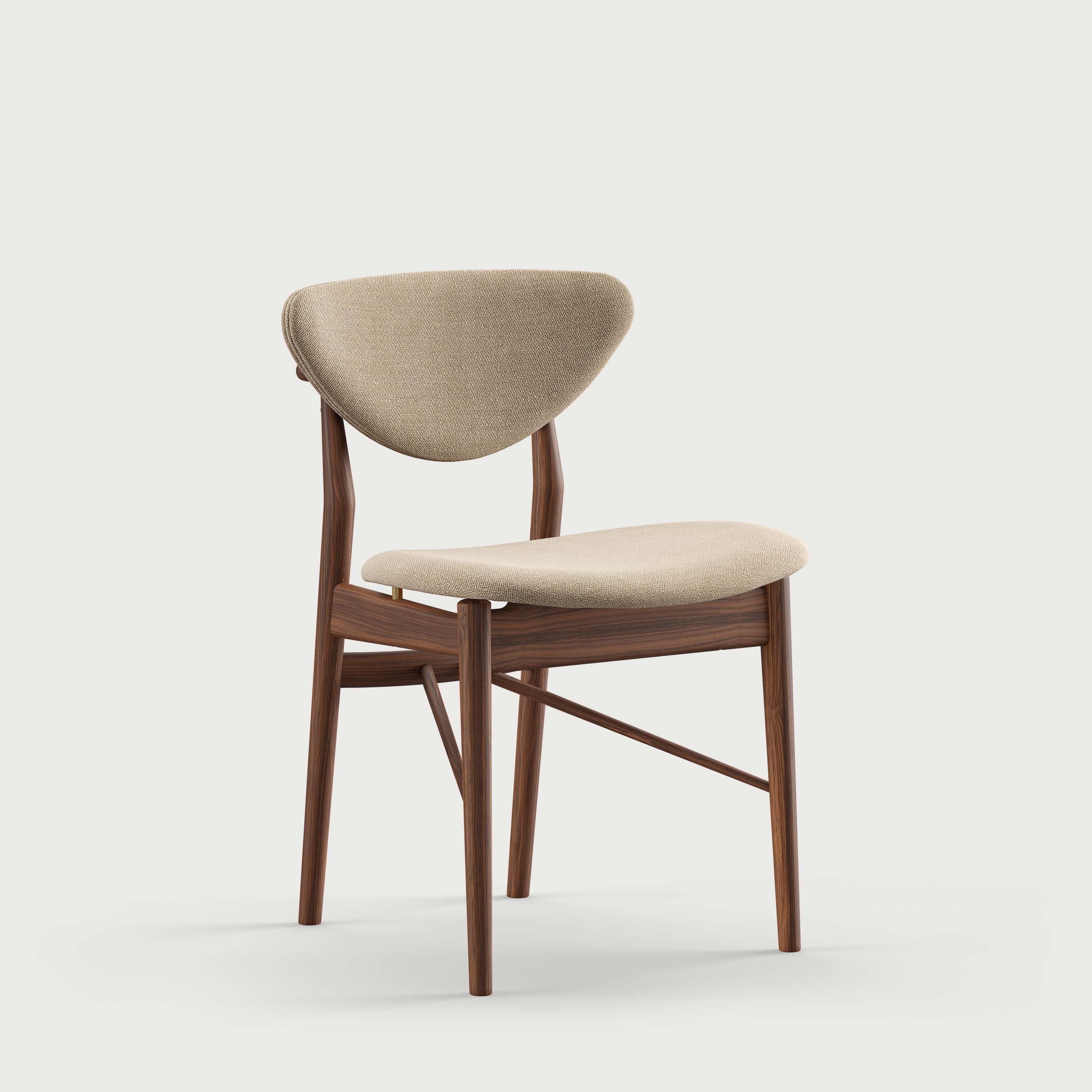 Chair designed by Finn Juhl in 1946, relaunched in 208.
Manufactured by House of Finn Juhl in Denmark.

To this day, Finn Juhl's designs are unconventional and defy expectations with subtle details. Finn Juhl himself once said that the deviation is