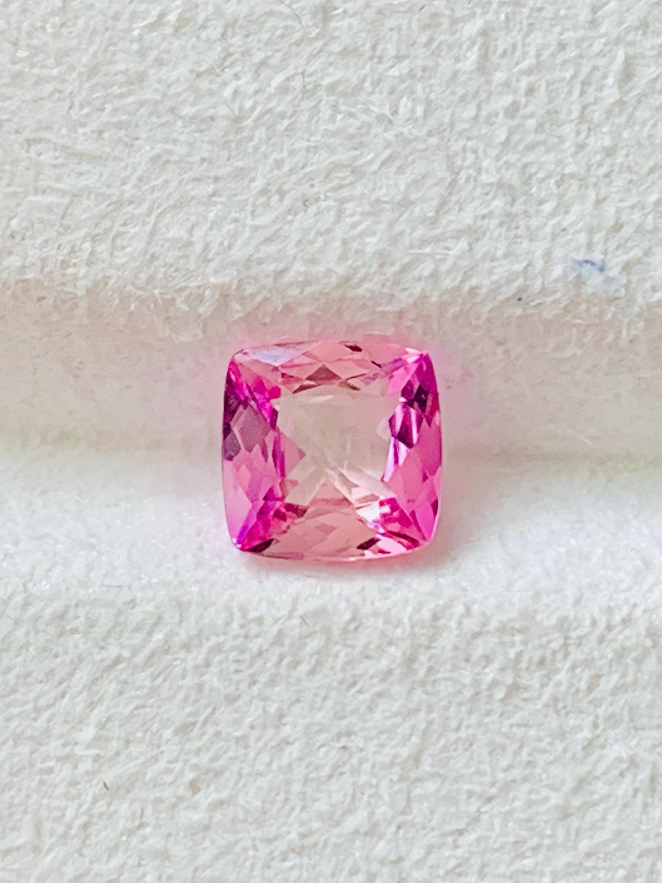 TZA213
GIA Certificate Natural Pink Tanzanite Unheated Zoisite Cushion shape Loop clean quality Tanzania Gemstone

GEM DESCRIPTION
Species:   Natural Tanzanite 
Variety:  Unheat Pink Tanzanite Zoisite 
Weight:  1.08ct 
Color:  Pink
Cut:  Excellent