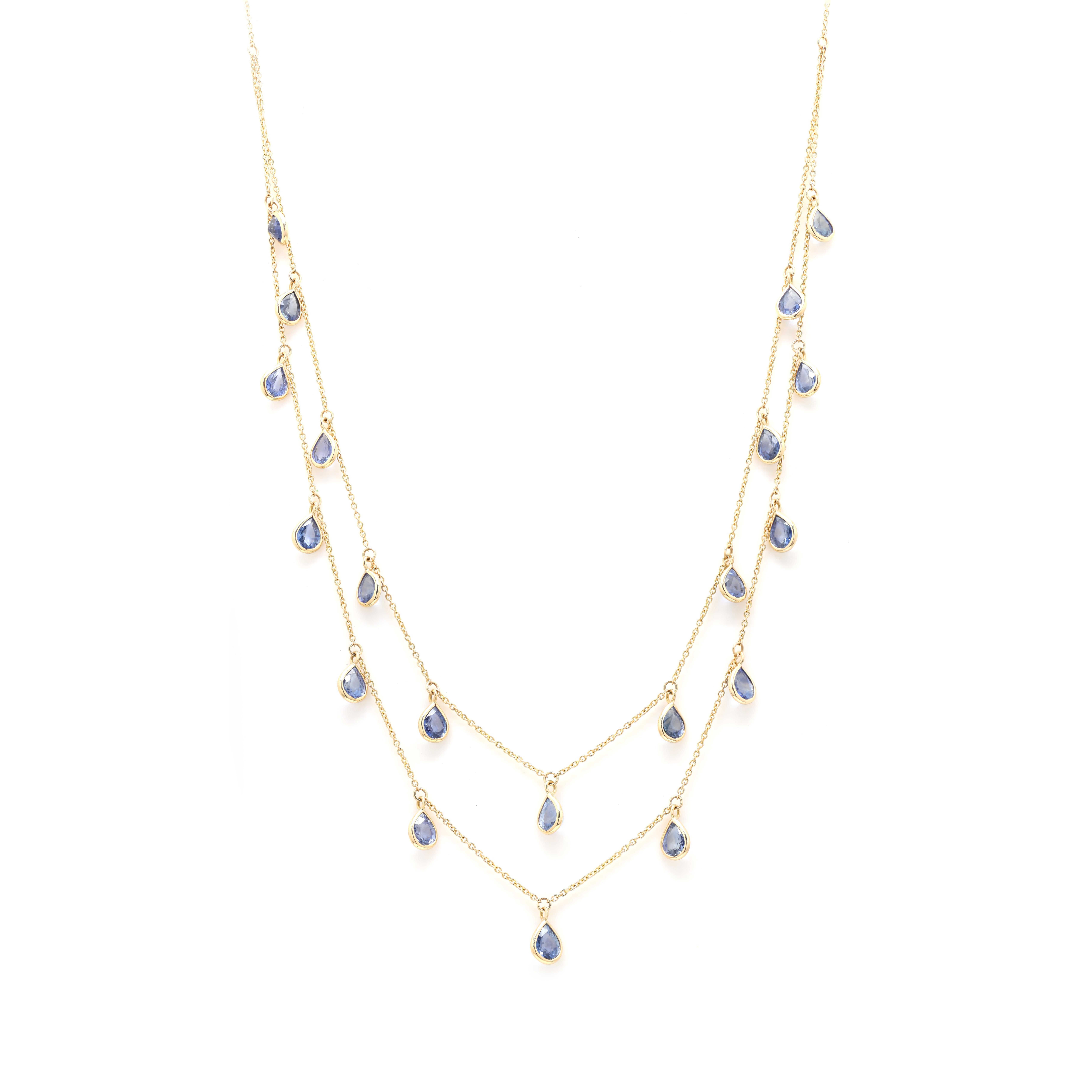 Sapphire Two Strand Chain Necklace studded with pear cut sapphire in 18k Gold. This stunning piece of jewelry instantly elevates a casual look or dressy outfit. 
Sapphire stimulates concentration and reduces stress.
Designed with pear cut sapphire