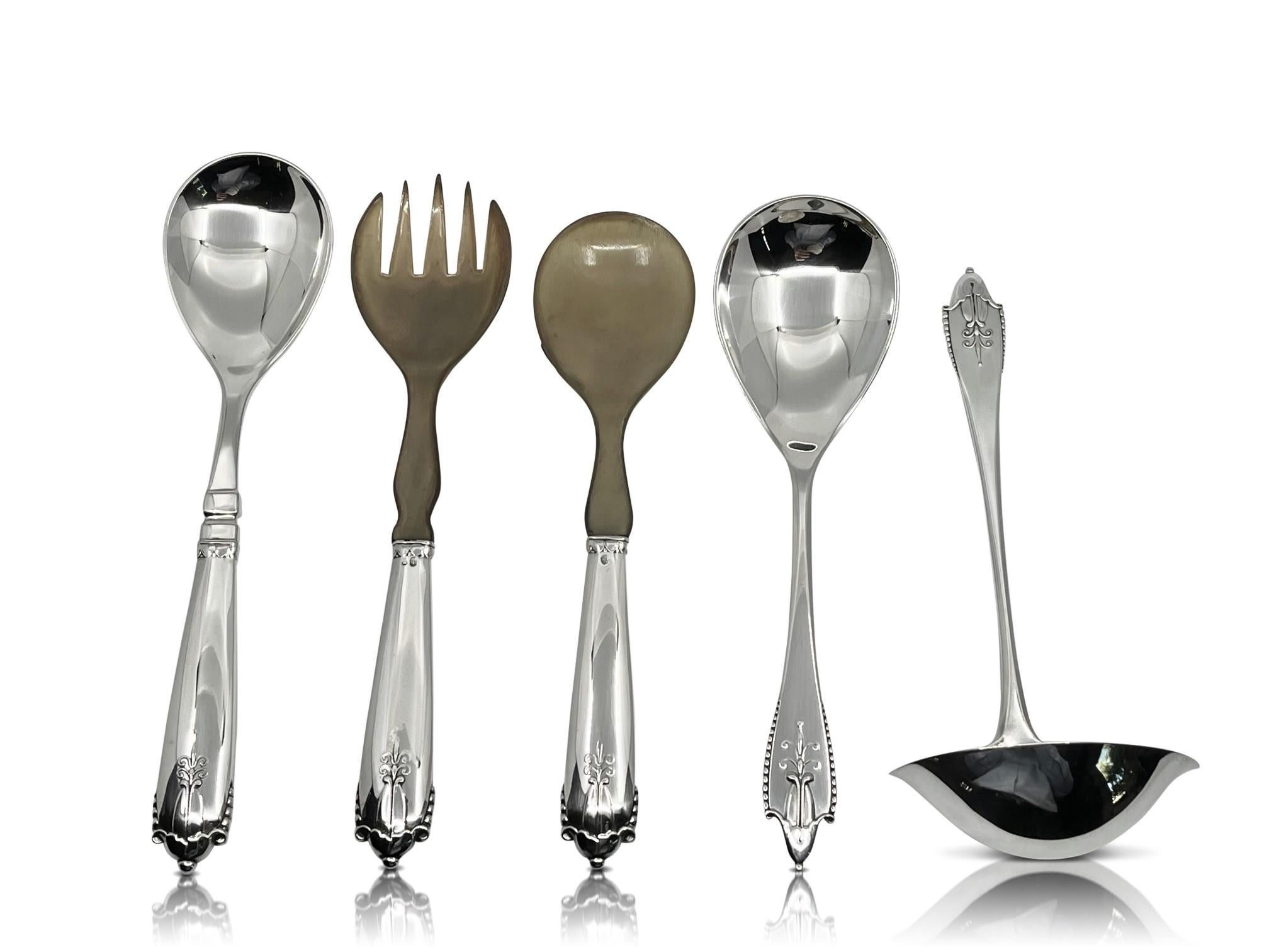 An early Georg Jensen silverware service in the Akkeleje pattern, design #77 by Georg Jensen from 1918. Its unusual to find a large complete set in this pattern, it is more unusual that nearly all the pieces were bought and are from the same period,