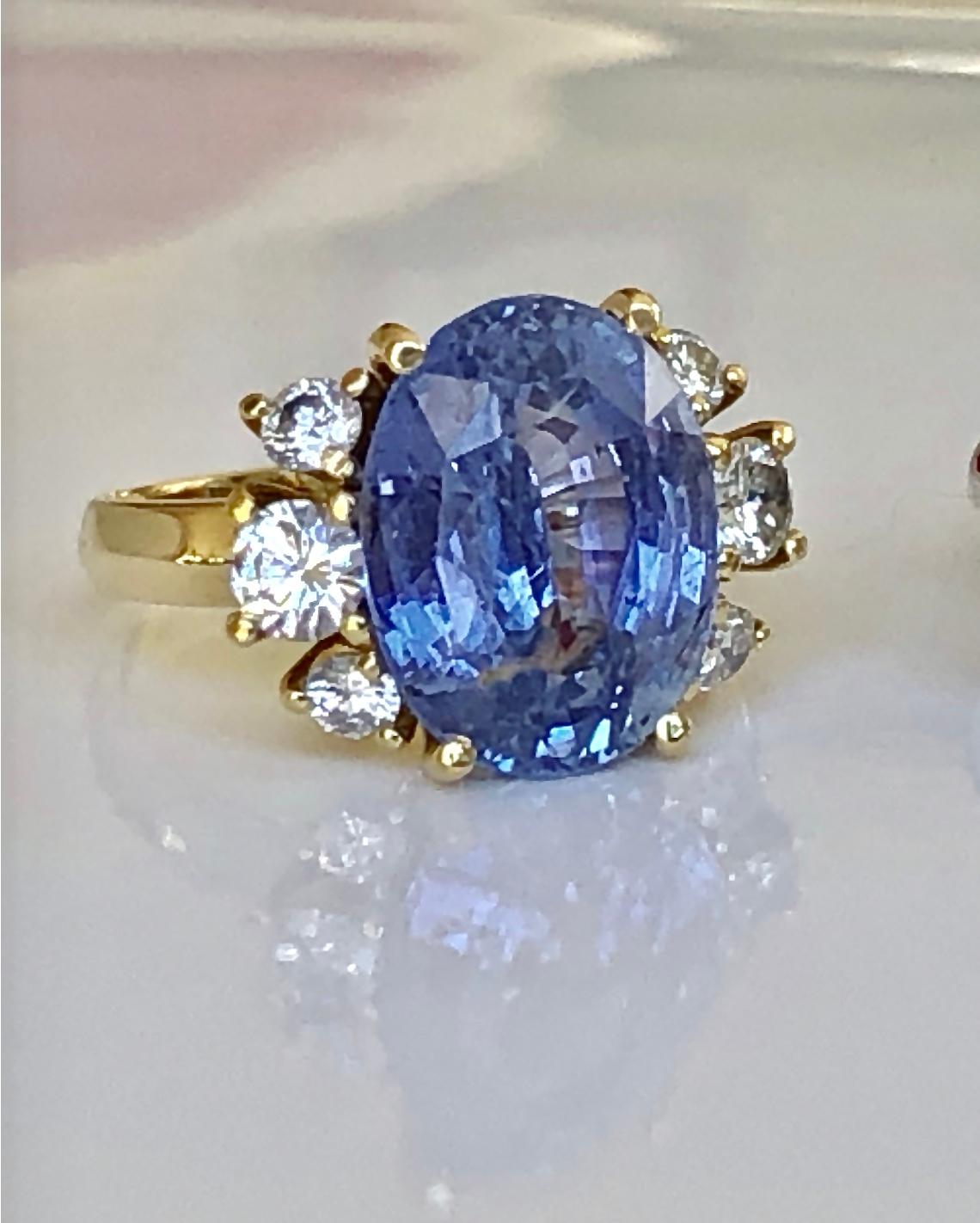 Natural Unheated Blue Sapphire and Diamond Cocktail Engagement Ring 
Centering a big 9.94 carat Natural Ceylon Sapphire, 