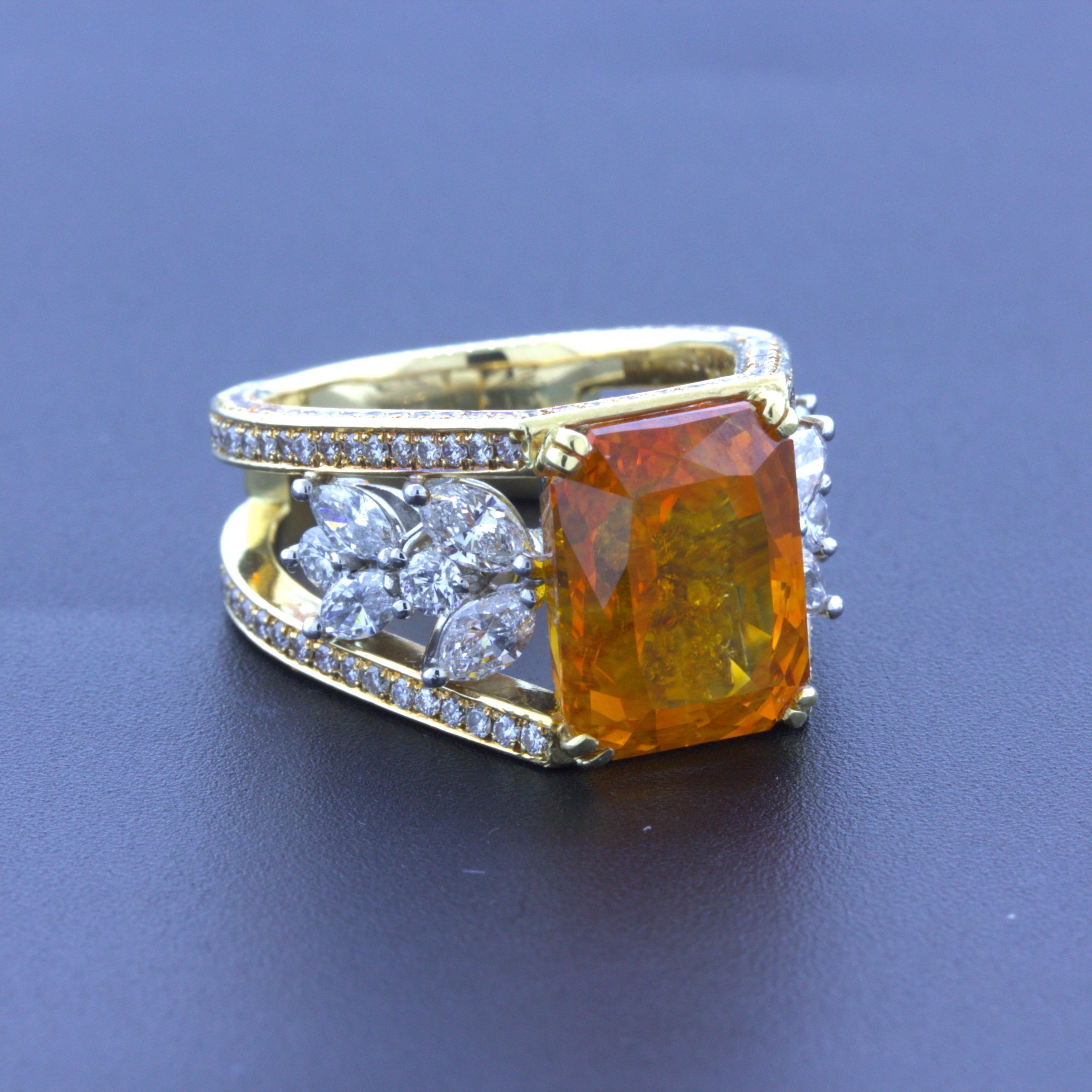 A ring fit for royalty! This regal and decorative piece features a large and impressive orange sapphire weighing 10.80 carats. The combination of its large size and fine quality makes this stone very special, as it has a rich velvety orange color