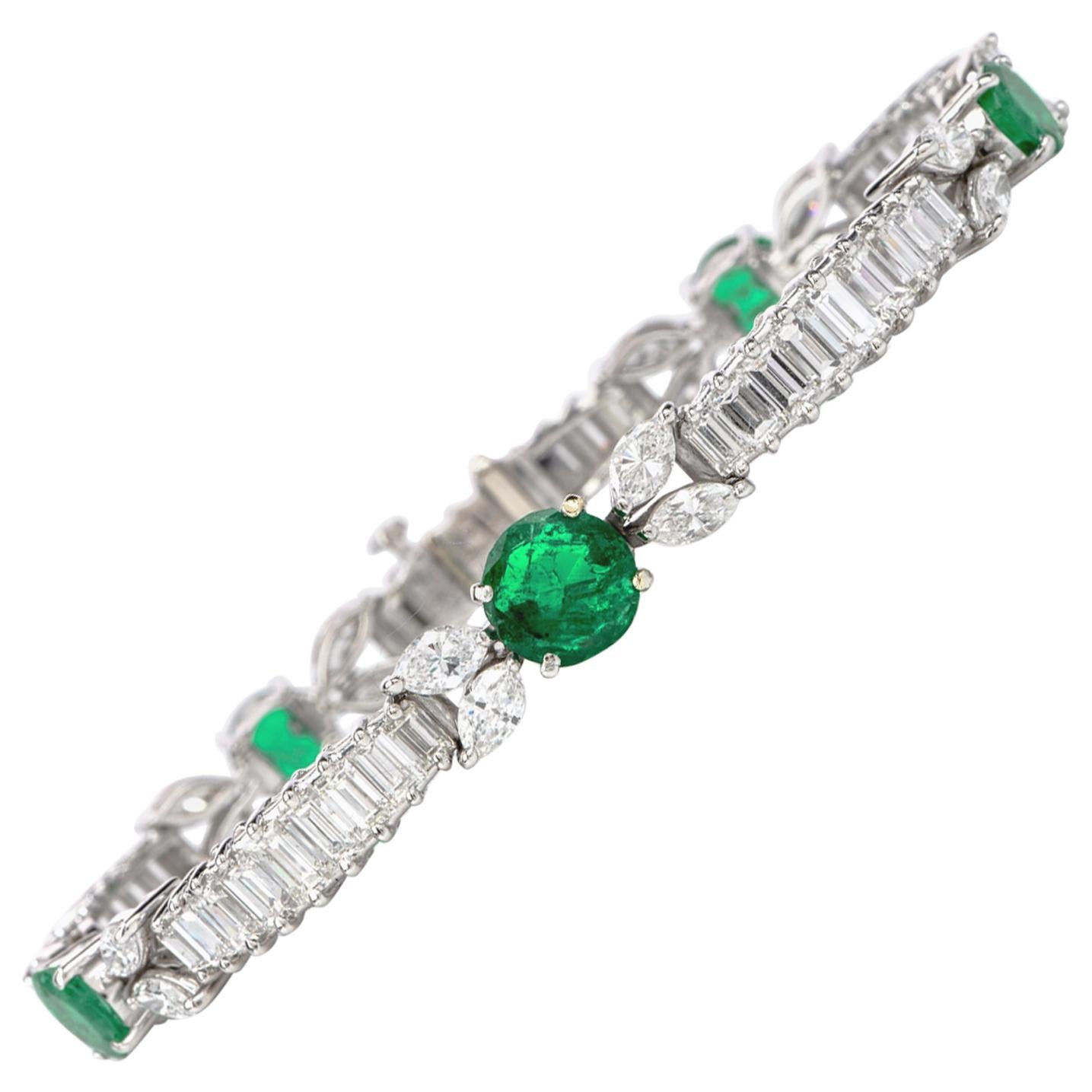 1980s Diamond Emerald Platinum Round Marquise and Baguette Bracelet