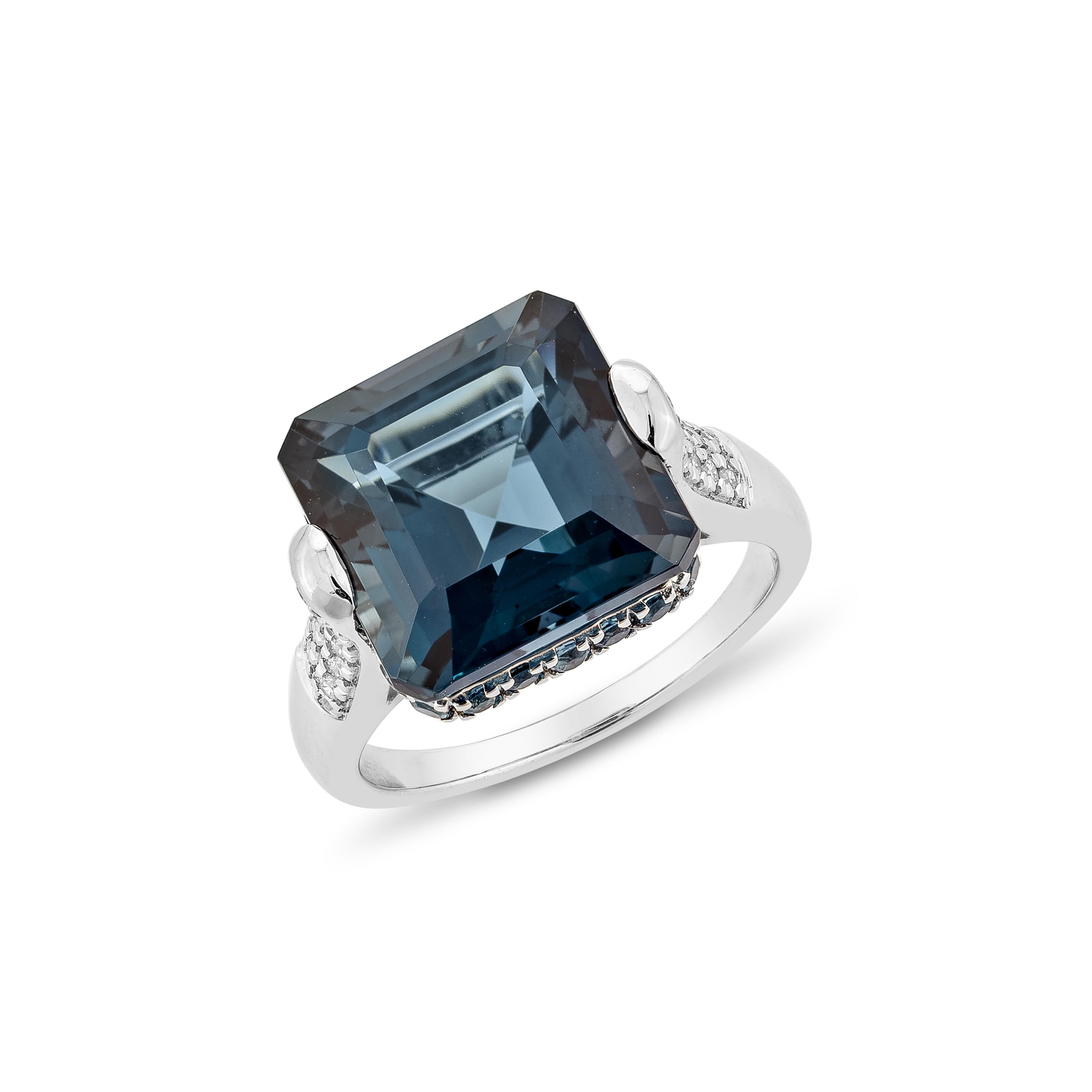 Contemporary 10.81 Carat London Blue Topaz Fancy Ring in 18KWG with White Diamond. For Sale