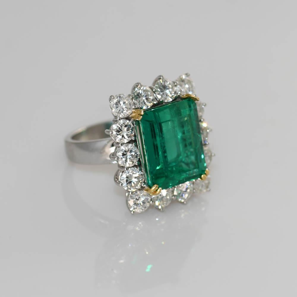 Emerald Cut 10.83 Emerald with GIA & AGL with Diamond Mount containing 
