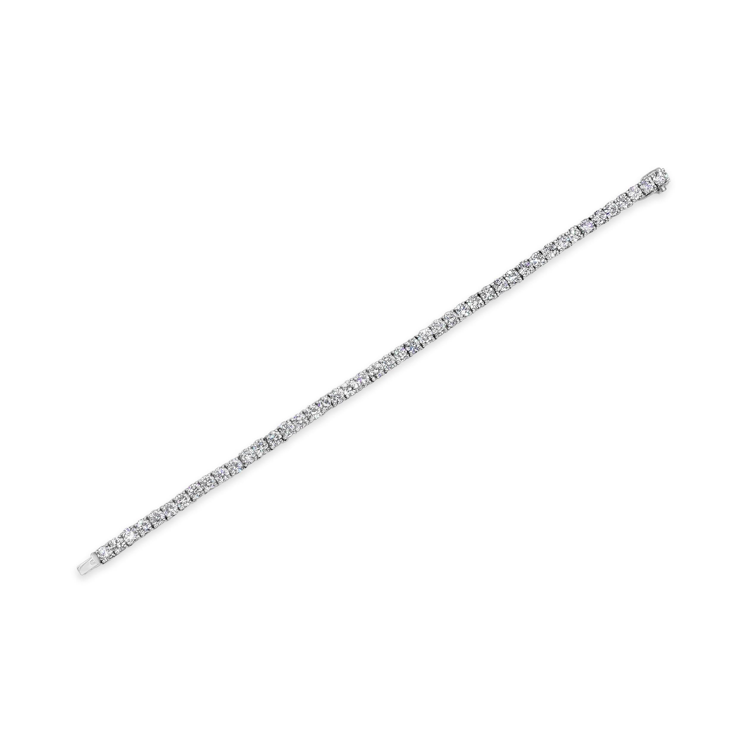 A classic tennis bracelet style showcasing a row of round brilliant diamonds weighing 10.85 carats total, F+ in Color and VS+ in Clarity. Made with Platinum 7 inches in Length. 

