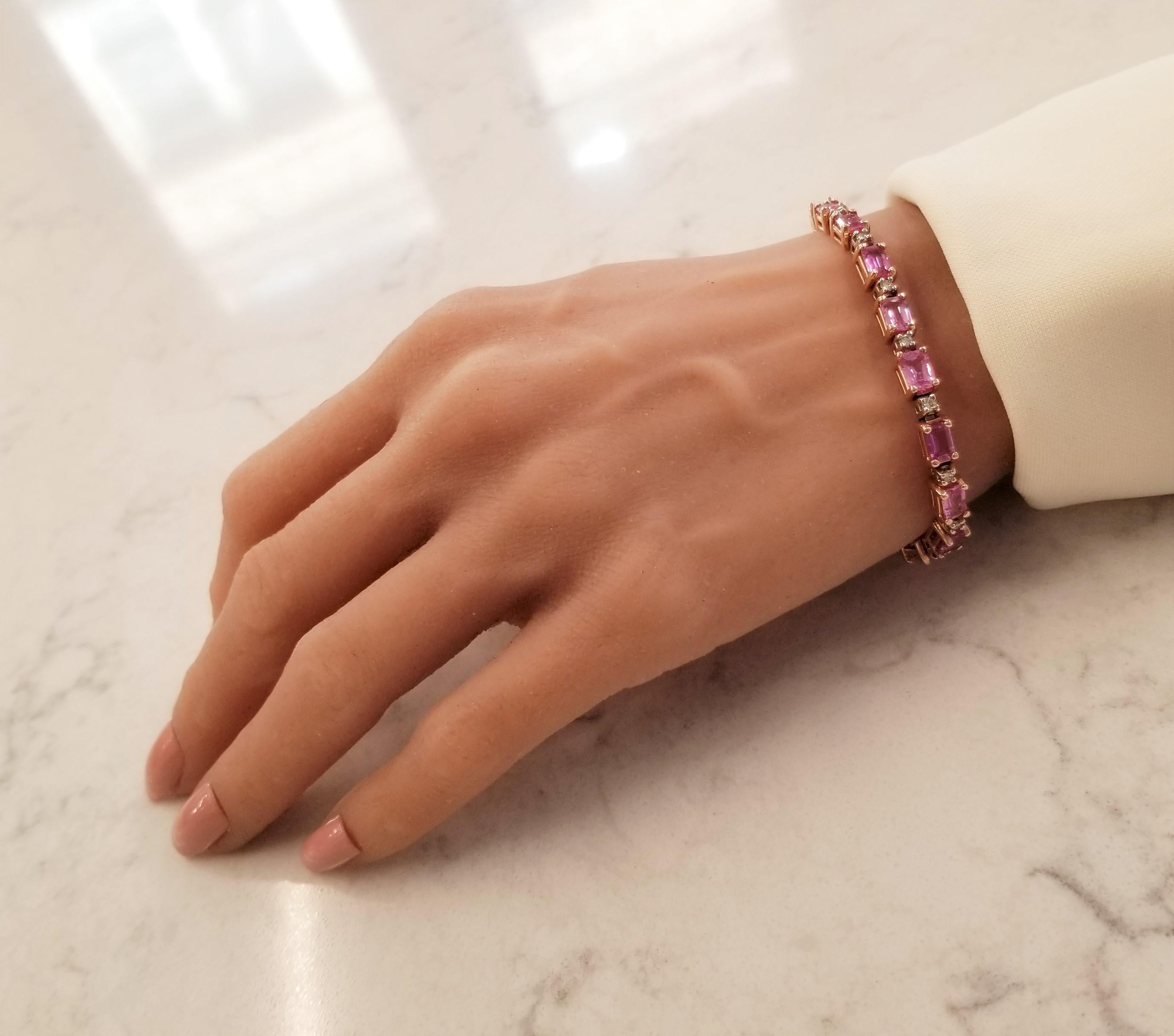 This is a pink sapphire and diamond bracelet. The beauty of the natural pink sapphires is its color: rose pink. The sapphires source is Sri Lanka. The pinks are perfectly matched in size, color, and luster. This wonderful bracelet features 10.85